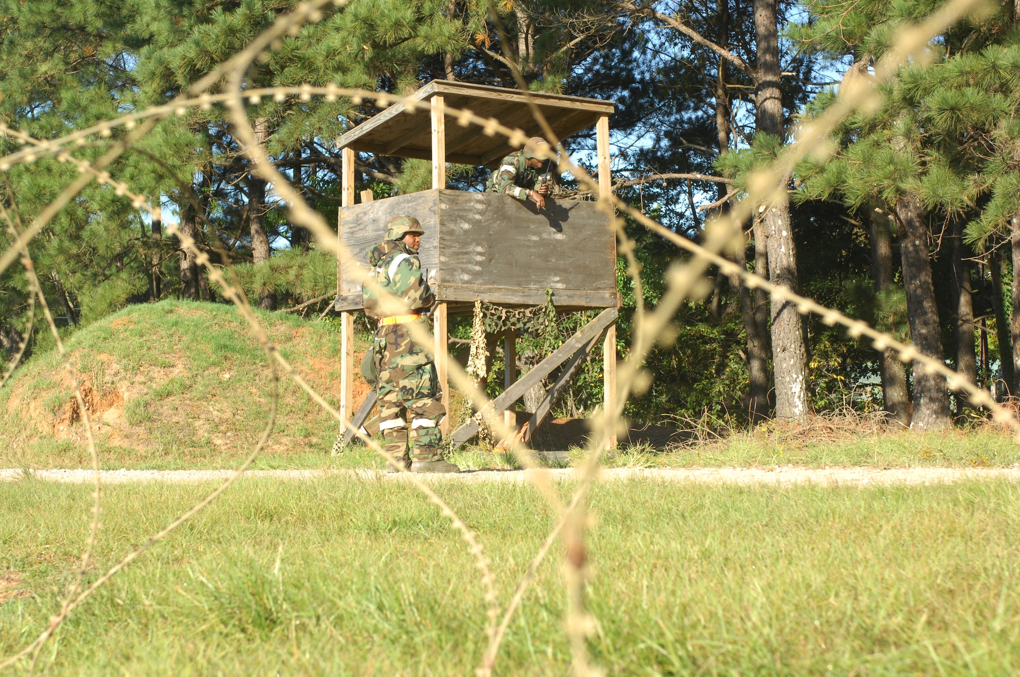 SHAW AIR FORCE BASE, S.C. -- Airmen of the 20th Fighter Wing stand guard at the 20th Civil Engineer compound during a Phase II Operational Readiness Exercise Oct. 15. OREs help prepare and evaluate Airmen for real-world deployment. (U.S. Air Force photo/Staff. Sgt Patrick Mitchell)