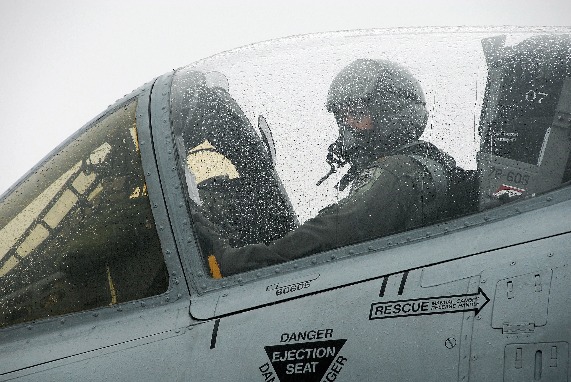 Maj. Preston McConnell, a 303rd Fighter Squadron A-10 Thunderbolt II pilot, waits for his crew chief to signal chocks-in after landing at the Salina Airport in Salina, Kan. Major McConnell flew the first A-10 to arrive at Salina for the Air Force's Hawgsmoke 2008; a biennial A-10 bombing and tactical gunnery competition. The event, hosted by Airmen from the 442nd FW's 303rd Fighter Squadron, tests A-10 pilots in flight leadership, target acquisition, weapons delivery. The 442nd FW is an Air Force Reserve Command unit based at Whiteman Air Force Base, Mo. (US Air Force photo/Master Sgt. Bill Huntington)