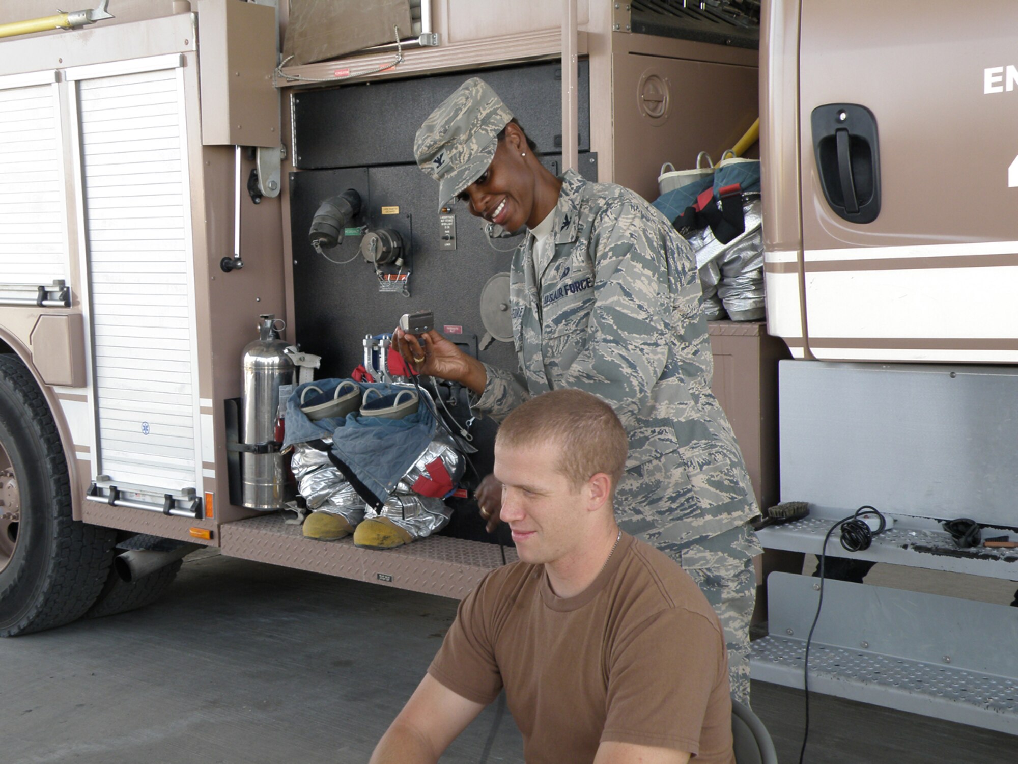 SOUTHWEST ASIA -- Tech. Sgt. Michael Watts, 386th Expeditionary Civil Engineer Squadron, gets his haircut during the fundraising event “Operation Baldy Bash” Oct. 11 at a base in Southwest Asia. The fundraiser, which raised more than $500, will go towards education, training and awareness programs for families that have children with disabilities. Sergeant Watts is deployed from the Oklahoma Air National Guard.