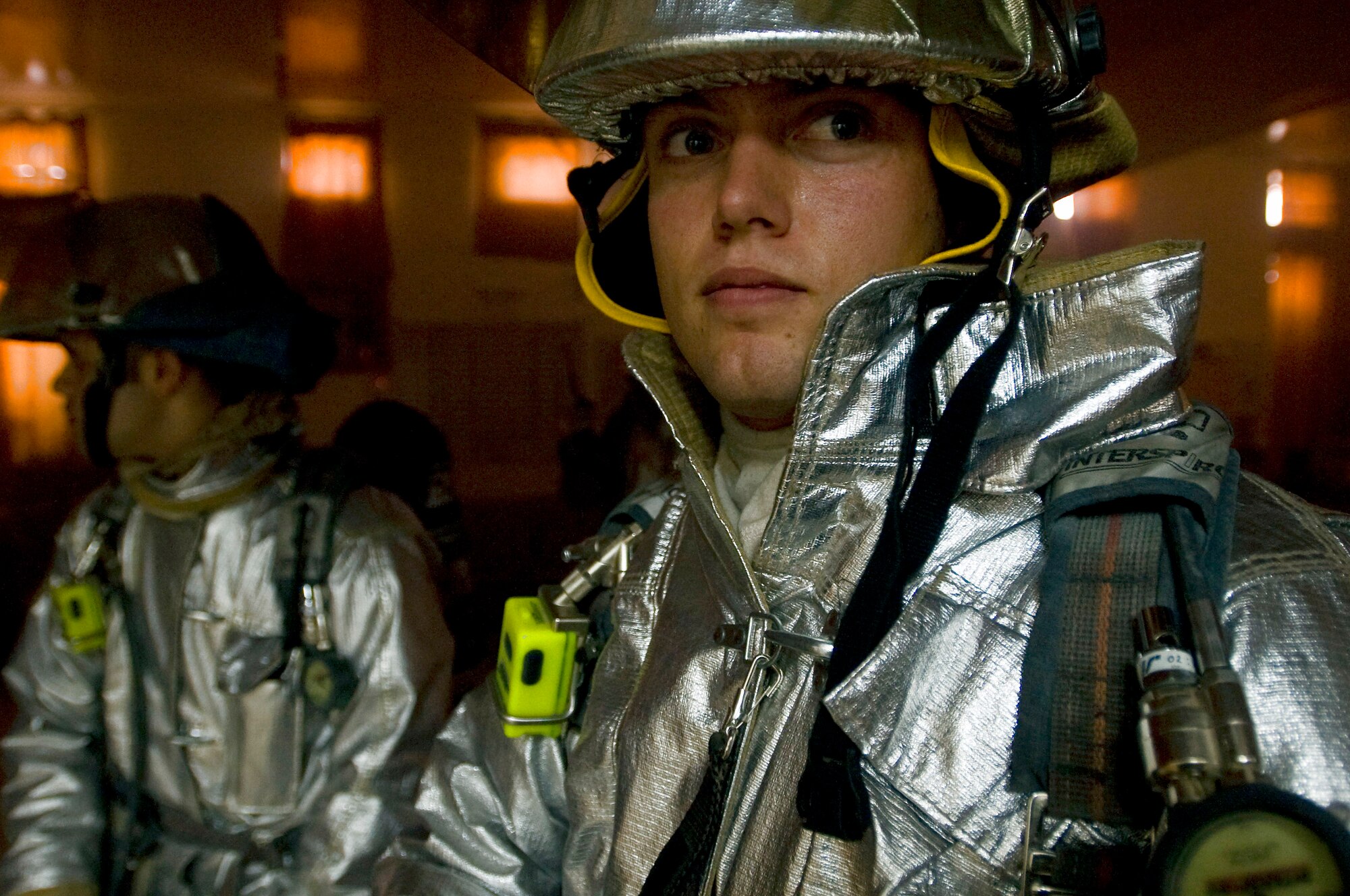 Senior Airman Nathan Sole scans a room for fire hazards during firefighter training Oct. 3 at Ali Base, Iraq. The 407th Expeditionary Civil Engineer Squadron's fire department held a structural drill to evaluate its response to fire alerts. Airman Sole, a firefighter with the 407th ECES, is deployed from the Minnesota Air National Guard's 133rd Airlift Wing. (U.S. Air Force photo/Airman 1st Class Christopher Griffin) 
