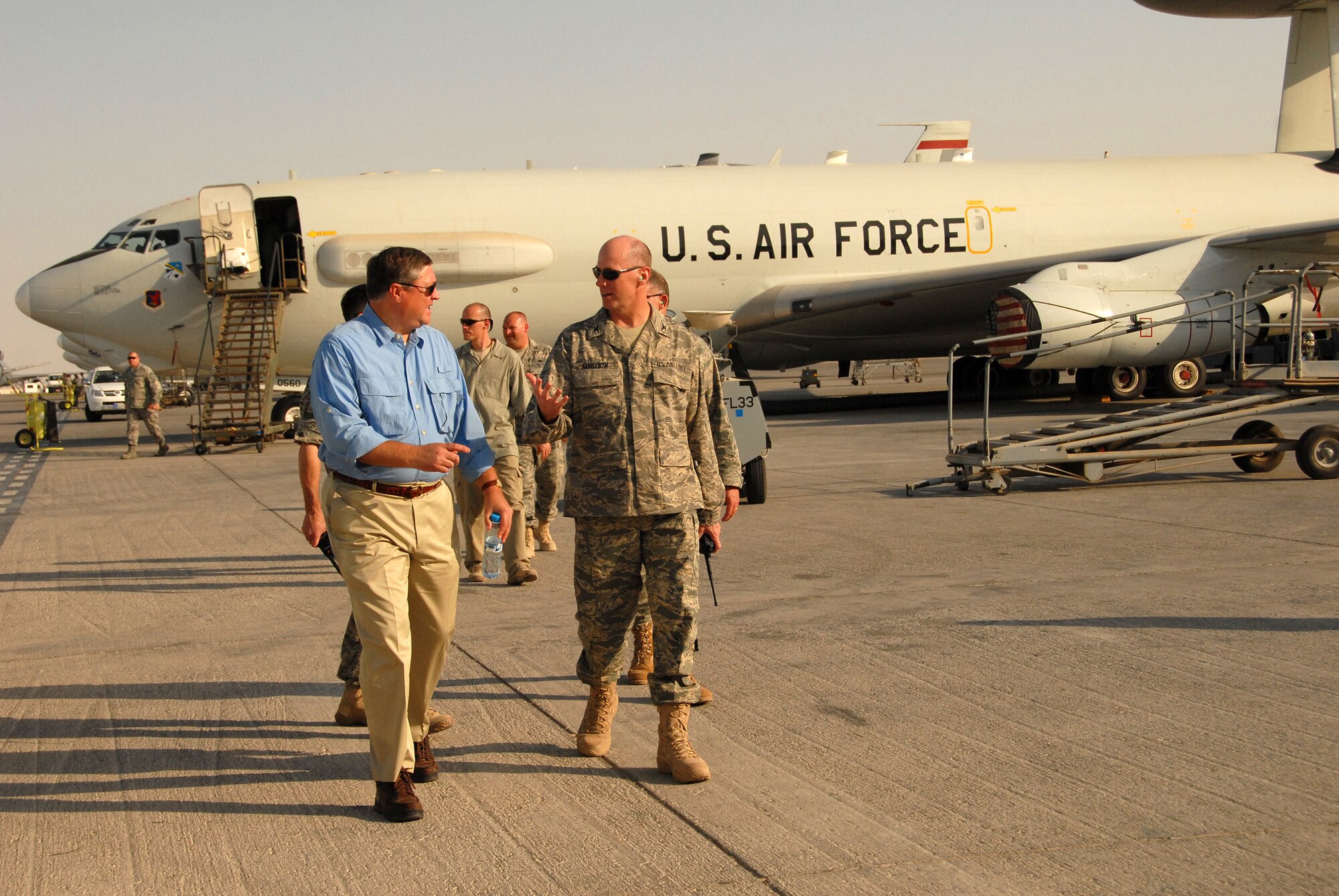 SOUTHWEST ASIA -- Secretary of the Air Force Michael B. Donley speaks to the 380th Expeditionary Maintenance Group Commander Col. Raymond Corcoran here Oct. 12. The Secretary visited the 380th Air Expeditionary Wing to gain a better understanding of the infrastructure and capabilities of one the smallest but most diverse bases in the Area of Responsibility. (U.S. Air Force photo/Tech. Sgt. Denise Johnson)(released)