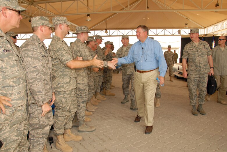 SOUTHWEST ASIA -- Secretary of the Air Force Michael B. Donley shakes the hands of several troops of the 380th Air Expeditionary Wing here Oct. 12. The Secretary visited the 380th Air Expeditionary Wing to gain a better understanding of the infrastructure and capabilities of one the smallest but most diverse bases in the Area of Responsibility. (U.S. Air Force photo/Tech. Sgt. Denise Johnson)(released)