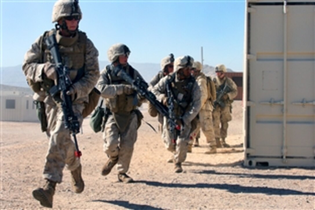 U.S. Marines and Navy sailors participate in a clearing exercise in the urban terrain facility on the Marine Corps Air Ground Combat Center in Twentynine Palms, Calif., Oct. 2, 2008. The Marines and sailors are assigned to Alpha Company, 1st Battalion, 7th Marine Regiment. 