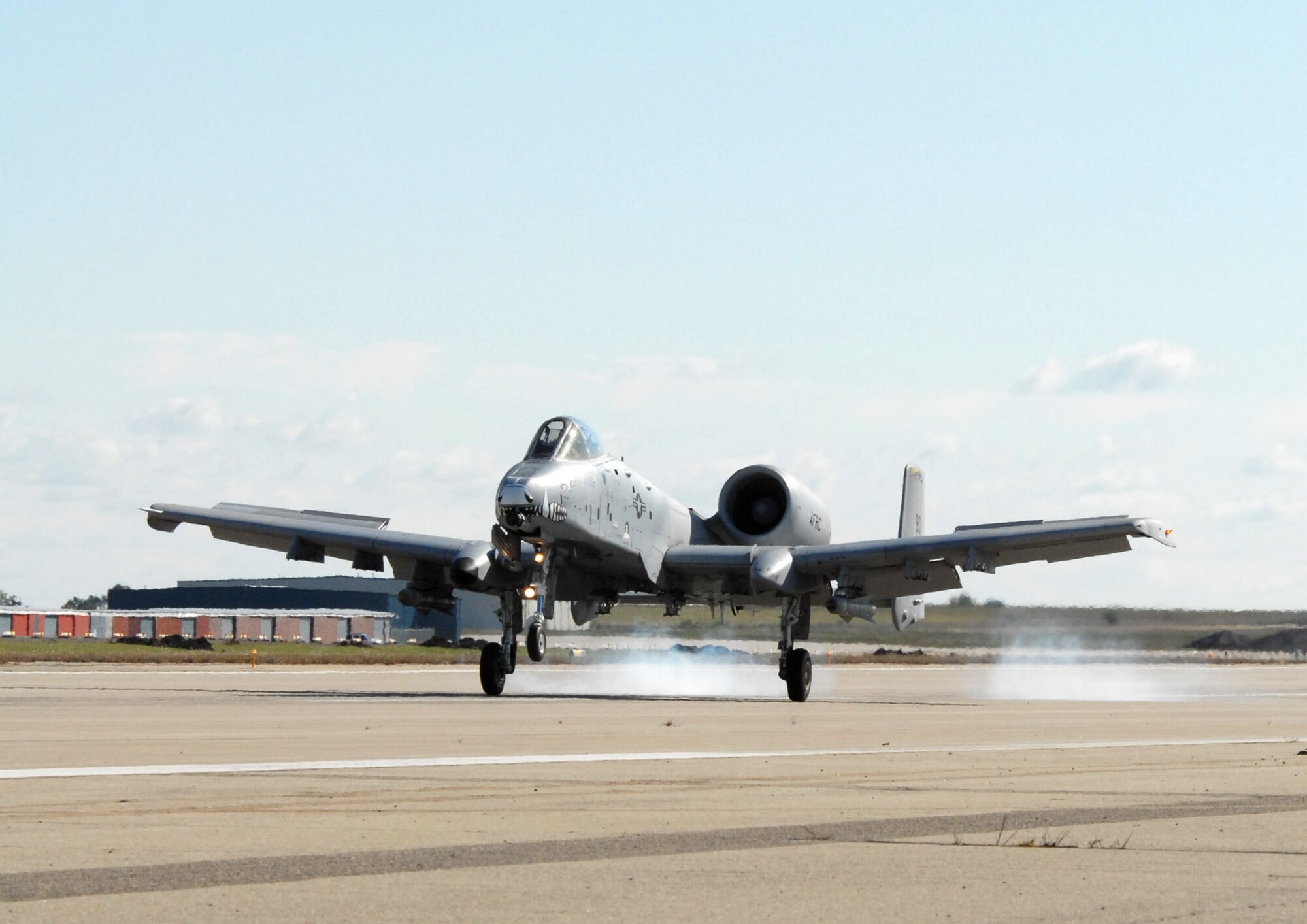 An A-10 Thunderbolt II from the Air Force Reserve Command's 917th Wing at Barksdale Air Force Base, La., touches down at the Salina, Kan., airport Oct. 15 for Hawgsmoke 2008, bienniel competition for A-10 pilots from across the Air Force that tests aerial bombing and gunnery skills.  (U.S. Air Force photo/Maj. David Kurle)