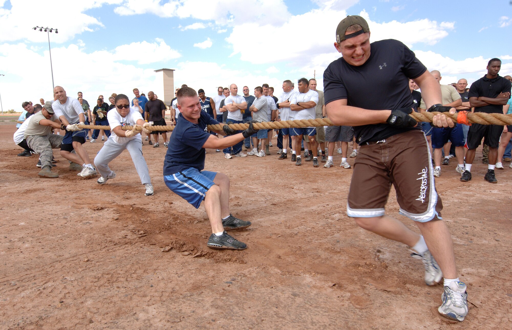 Airmen from 49th Fighter Wing compete in the tug-of-war competition during Sports Day at Holloman Air Force Base, N.M., October 10. Airmen from all squadrons come out to participate in many of Hollomans 15 different events. (U.S. Air Force photo/Airman 1st Class Michael Means)