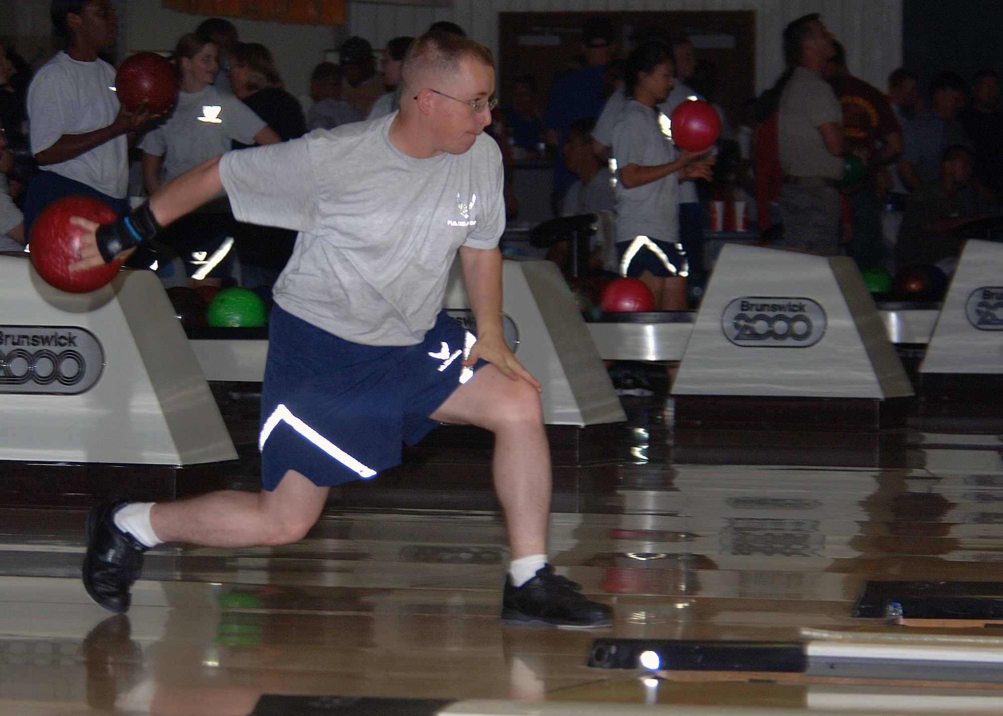 Senior Airman Jason Davis, 49th Contracting Squadron, competes in nine-pin no-tap bowling on Sports Day at  Holloman Air Force Base, N.M., October 10. Airmen from all squadrons come out to participate in many of Hollomans 15 different events. (U.S. Air Force photo/Airman 1st Class Michael Means)