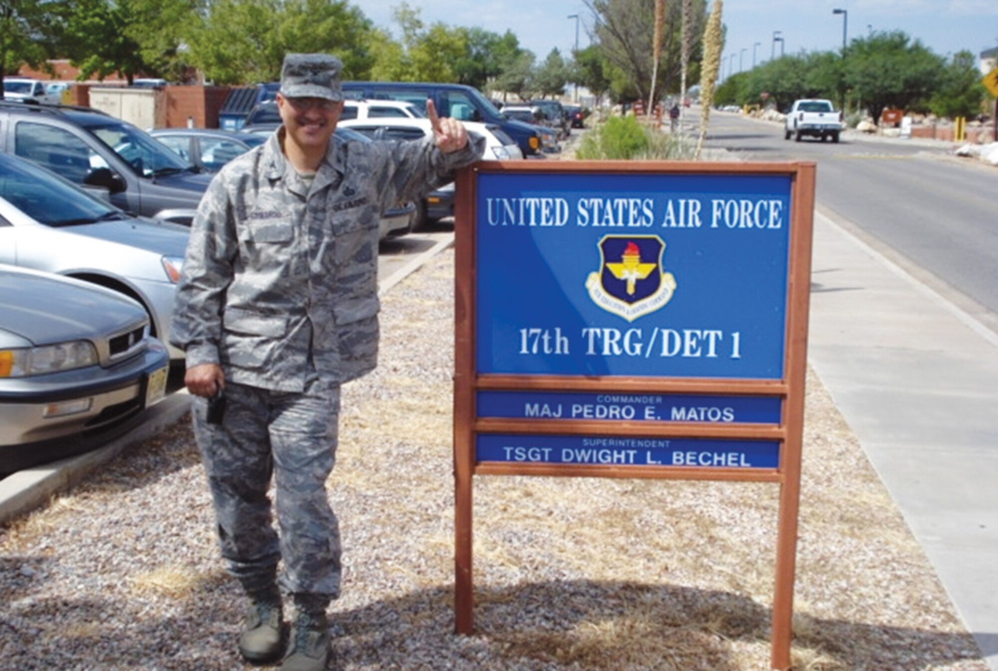 Colonel Anthony Lombardo, 17th Training Group commander, poses by the 17th Training Group Detachment 1 sign at Fort Huachuca, Ariz., during the Goodfellow Air Force Base leadership visit to Det. 1 Oct. 7-9. (U.S. Air Force photo)
