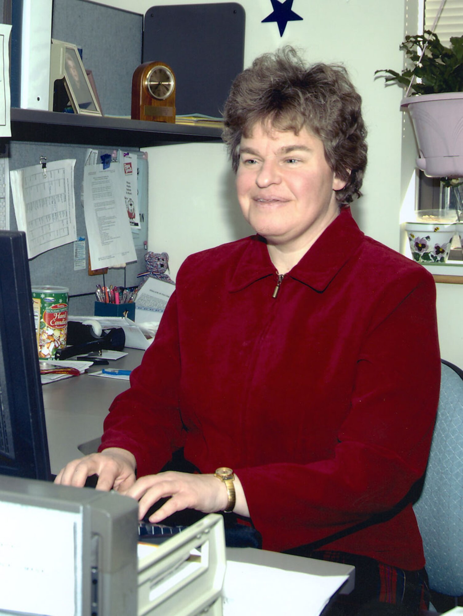 HANSCOM AFB, Mass. - Joanne Jordan, lead information manager for the 950th Electronic Systems Group, works at her computer. Ms. Jordan, who has been blind since birth, recently won the Outstanding Department of Defense Employee with a Disability Award for 2008. (File photo)