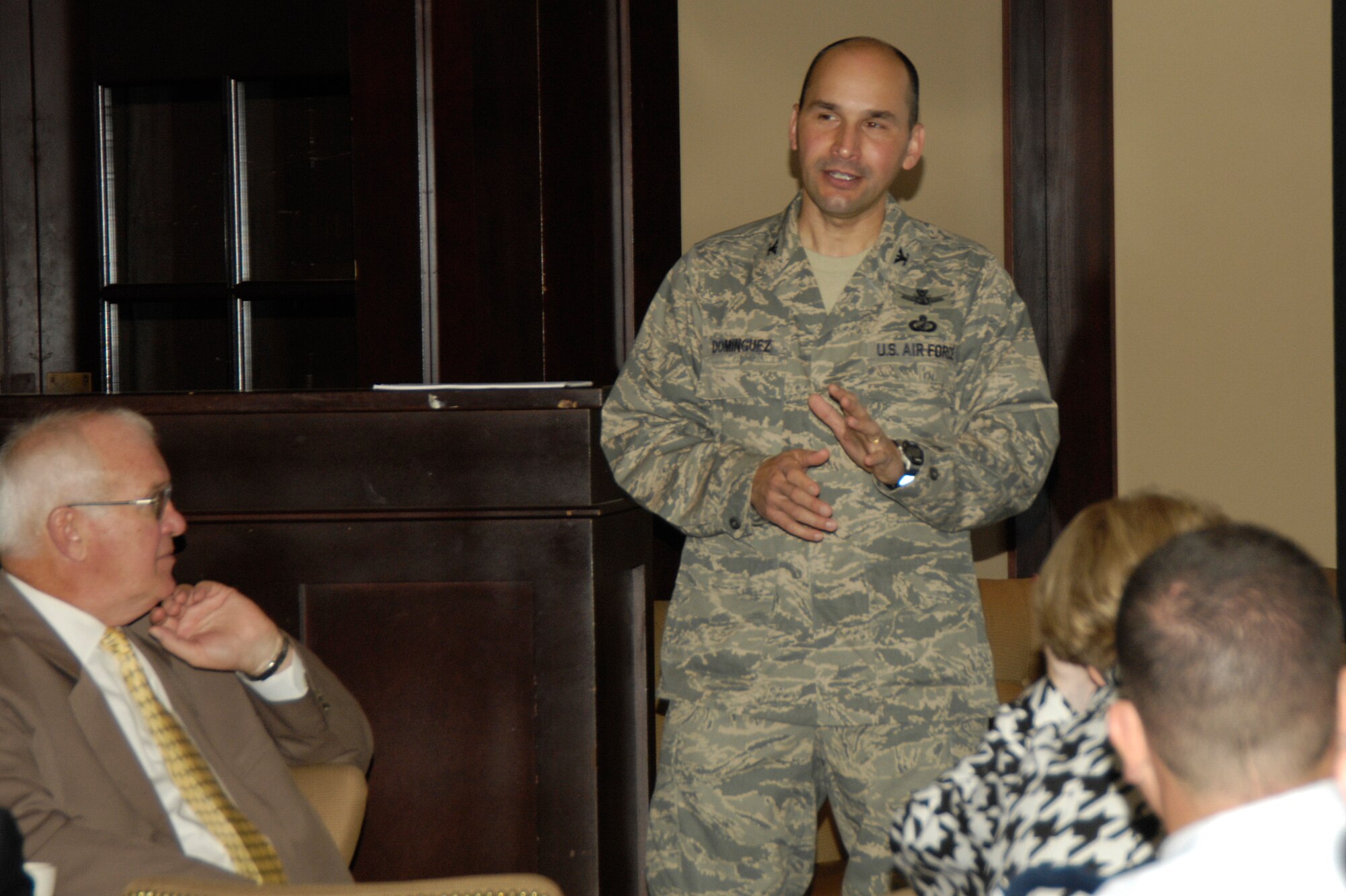 Col. Rob Dominguez, 350th Electronic Systems Wing commander, speaks to a mixed government-industry crowd during today's Military Affairs Council Breakfast at Max Stein's in Lexington. The colonel spoke about how the wing has tackled the challenges of delivering warfighter capabilities. (Photo by Linda LaBonte-Britt)

