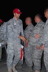 About 110 Airmen from the 556th REDHORSE Squadron returned from deployment on Sunday, October 12, 2008. When the Reserve Airmen arrived home, about 300 friends, family and unit members were there to welcome them with hugs and hand-made banners. REDHORSE is an acronym for Rapid Engineer Deployable Heavy Operational Repair Squadron Engineers. The REDHORSE Airmen deployed to three different countries within the U.S. Central Command Area of Responsibility. During the deployment, they dug wells for Afghanis, repaired existing structures in Iraq and supported base construction and repair needs throughout the AOR. The 556th REDHORSE Squadron is due to relocate to Florida later this year but many of the Reservists will remain at Lackland Air Force Base as new members of the 433rd Civil Engineer Squadron. (U.S. Air Force Photo/Master Sgt. Collen McGee) 