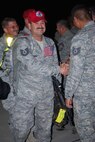 About 110 Airmen from the 556th REDHORSE Squadron returned from deployment on Sunday, October 12, 2008. When the Reserve Airmen arrived home, about 300 friends, family and unit members were there to welcome them with hugs and hand-made banners. REDHORSE is an acronym for Rapid Engineer Deployable Heavy Operational Repair Squadron Engineers. The REDHORSE Airmen deployed to three different countries within the U.S. Central Command Area of Responsibility. During the deployment, they dug wells for Afghanis, repaired existing structures in Iraq and supported base construction and repair needs throughout the AOR. The 556th REDHORSE Squadron is due to relocate to Florida later this year but many of the Reservists will remain at Lackland Air Force Base as new members of the 433rd Civil Engineer Squadron. (U.S. Air Force Photo/Master Sgt. Collen McGee) 
