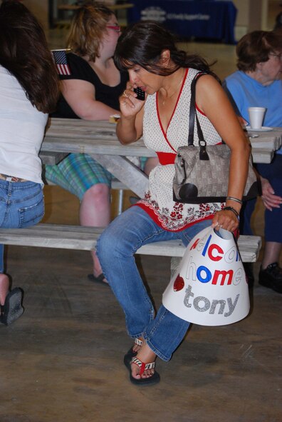 About 110 Airmen from the 556th REDHORSE Squadron returned from deployment on Sunday, October 12, 2008. When the Reserve Airmen arrived home, about 300 friends, family and unit members were there to welcome them with hugs and hand-made banners. REDHORSE is an acronym for Rapid Engineer Deployable Heavy Operational Repair Squadron Engineers. The REDHORSE Airmen deployed to three different countries within the U.S. Central Command Area of Responsibility. During the deployment, they dug wells for Afghanis, repaired existing structures in Iraq and supported base construction and repair needs throughout the AOR. The 556th REDHORSE Squadron is due to relocate to Florida later this year but many of the Reservists will remain at Lackland Air Force Base as new members of the 433rd Civil Engineer Squadron. (U.S. Air Force Photo/Master Sgt. Collen McGee) 