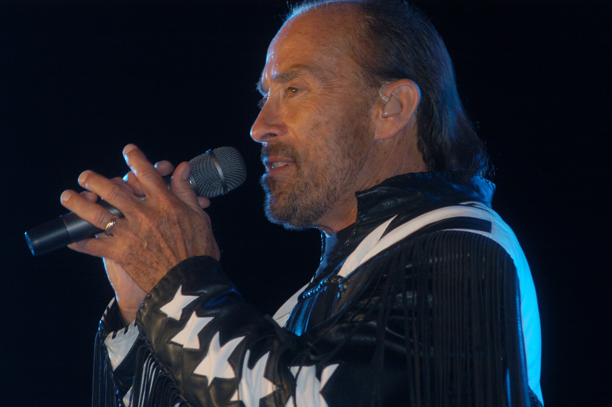 Lee Greenwood and the Band of the Air Force Reserve will perform a free concert in front of the Museum of Aviation Saturday during the grand opening weekend of the new World War II hangar. U. S. Air Force file photo by Sue Sapp   