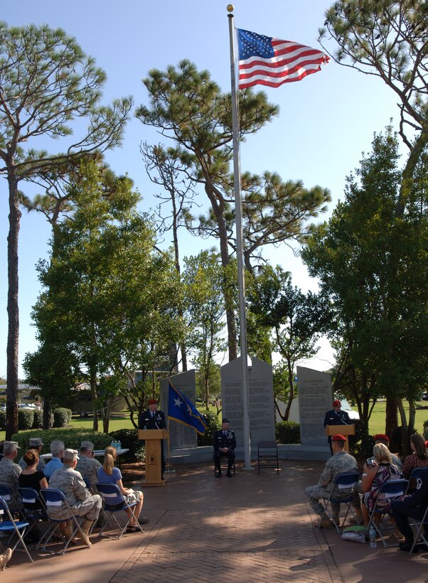 Lt. Col. Brett Nelson, 23rd Special Tactics Squadron commander, provides opening remarks during a medals ceremony at the Hurlburt Field Air Park on Oct 14. The ceremony was presided over by Air Force Special Operations Command commander Lt. Gen. Donny Wurster(seated in center).(U.S. Air Force photo/Senior Airman Emily Moore)