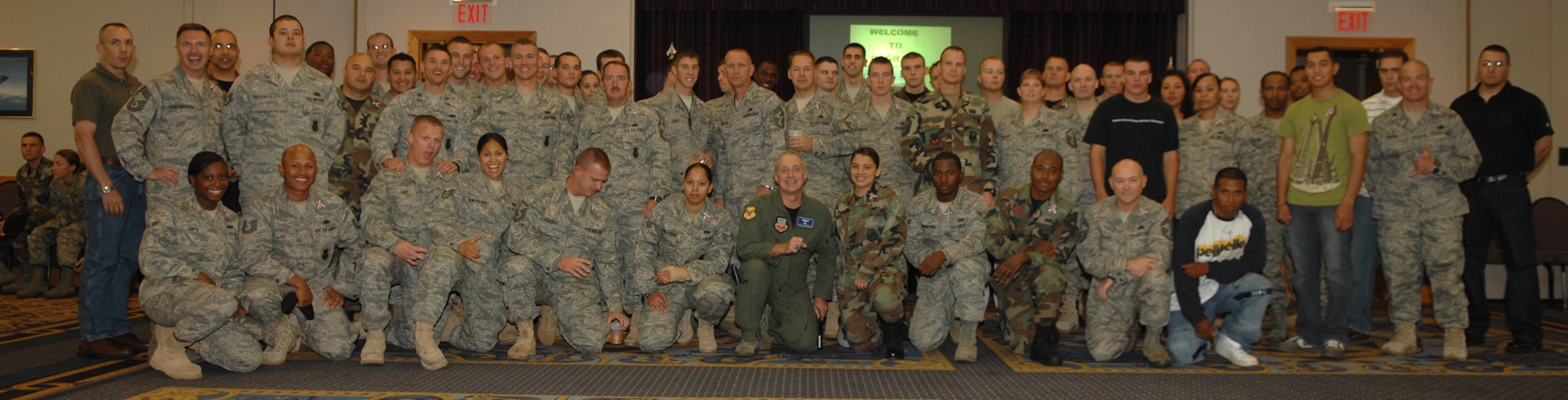 WHITEMAN AIR FORCE BASE, Mo. – Brig. Gen . Garrett Harencak, 509th Bomb Wing commander, and Chief Master Sgt. Brian Hornback, 509th Bomb Wing command chief, pose with Whiteman Warriors who recently came back from deployment at the Warrior Welcome Back Oct. 8. The Warrior Welcome Back was funded by the Whiteman Base Community Council. (U.S. Air Force photo/Senior Airman Stephen Linch)