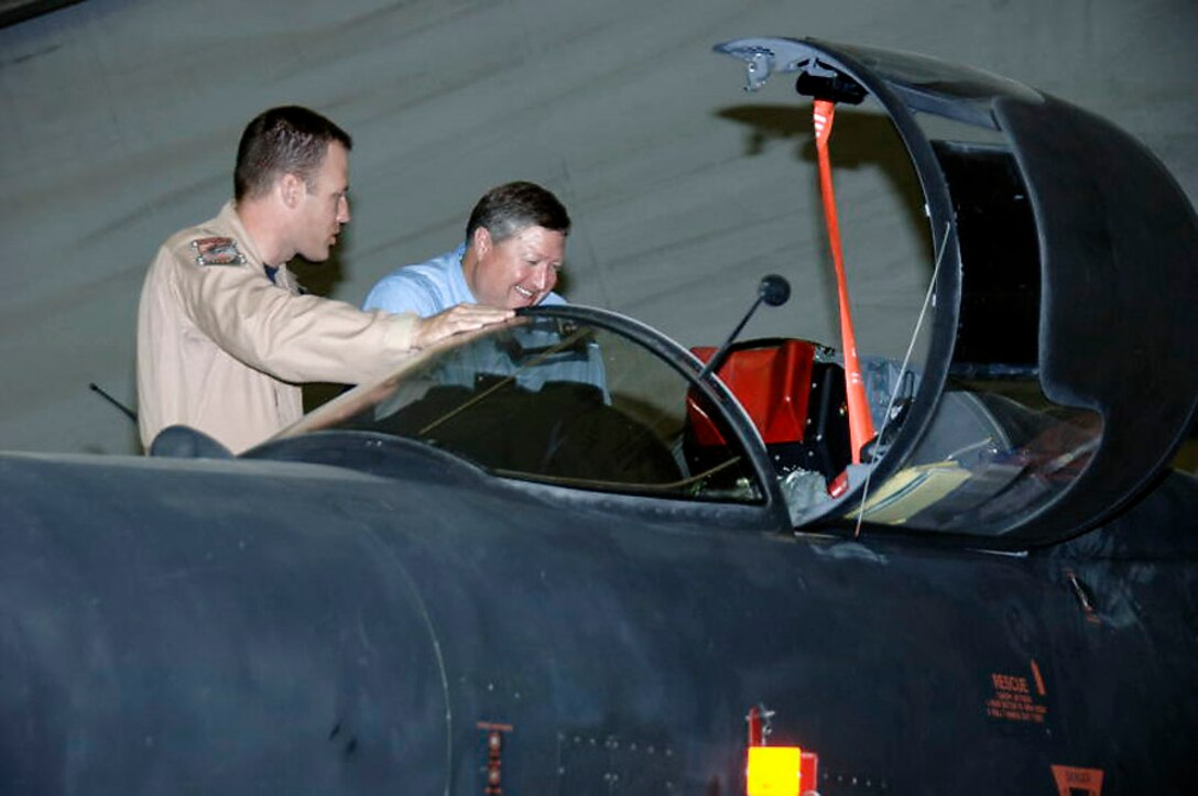 Lt. Col. Vincent Catich shows Secretary of the Air Force Michael Donley the cockpit of a U-2 Dragonlady during the secretary's visit to the 380th Air Expeditionary Wing Oct. 12 at an air base in Southwest Asia . The secretary visited the wing to gain a better understanding of the infrastructure and capabilities of one the smallest but most diverse bases in the Air Forces Central area of responsibility. (U.S. Air Force photo/Tech. Sgt. Christopher A. Campbell)