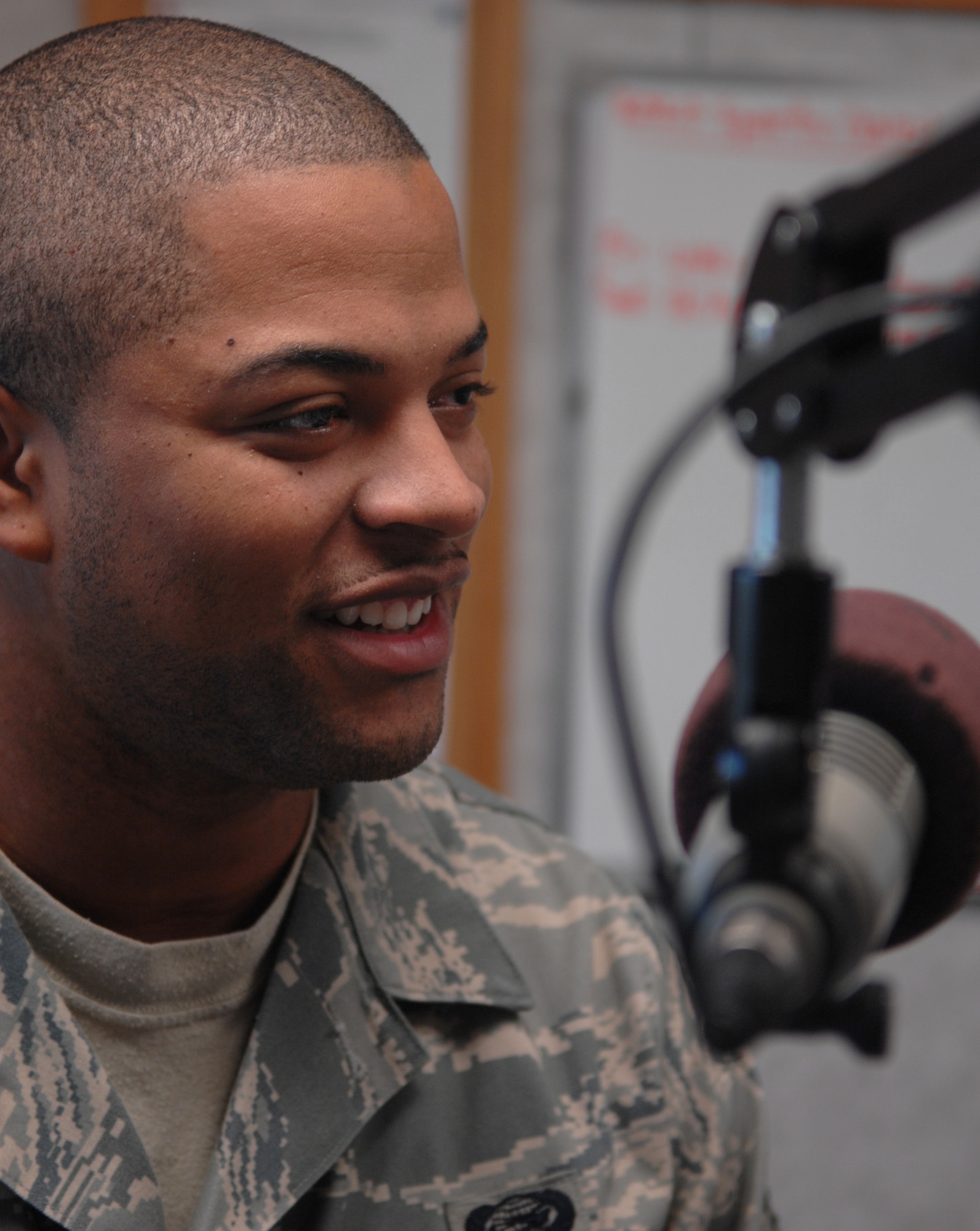WARRENSBURG, Mo. –Senior Airman Ricky Mahaney, 509th Force Support Squadron, talks during a radio show with Marion “Woody” Woods about his time as a high-school and college football player on KOKO Oct. 16. The Whiteman Report airs on KOKO, 1450 AM the third Thursday of the month at 9:10 a.m. The Whiteman Public Affairs minimally coordinates two radio shows a month and is always looking for speakers. If you are interested in being on a radio show please call public affairs at 687-6123. (U.S. Air Force photo/Senior Airman Stephen Linch)