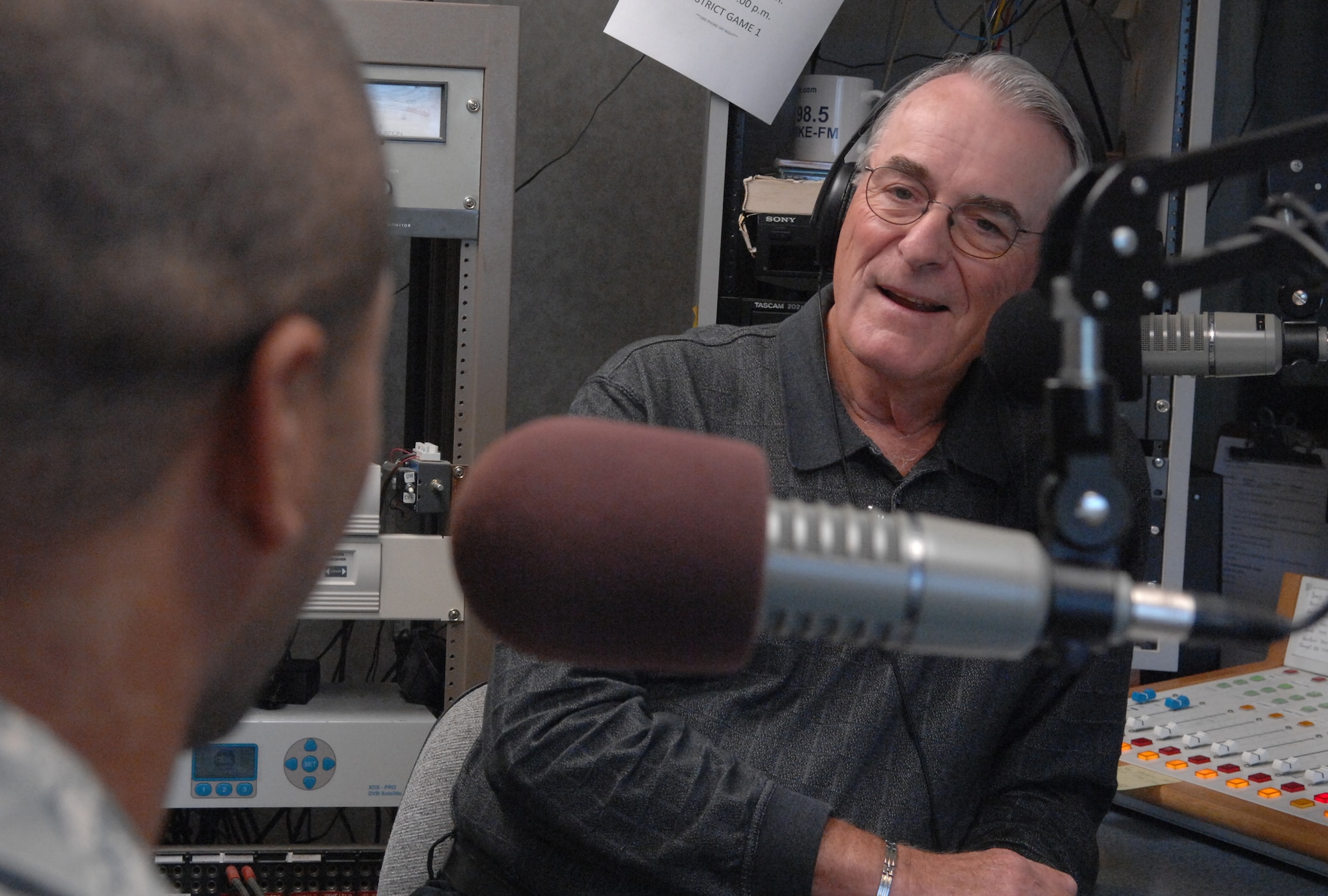 WARRENSBURG, Mo. – Senior Airman Ricky Mahaney, 509th Force Support Squadron, talks to Marion “Woody” Woods during the Whiteman Report on KOKO Radio Oct. 16. The Whiteman Report is aired on KOKO, 1450 AM the third Thursday of the month at 9:10 a.m. The Whiteman Public Affairs minimally coordinates two radio shows a month and is always looking for speakers. If you are interested in helping tell the Whiteman story on a radio show please call public affairs at 687-6123. (U.S. Air Force photo/Senior Airman Stephen Linch)
