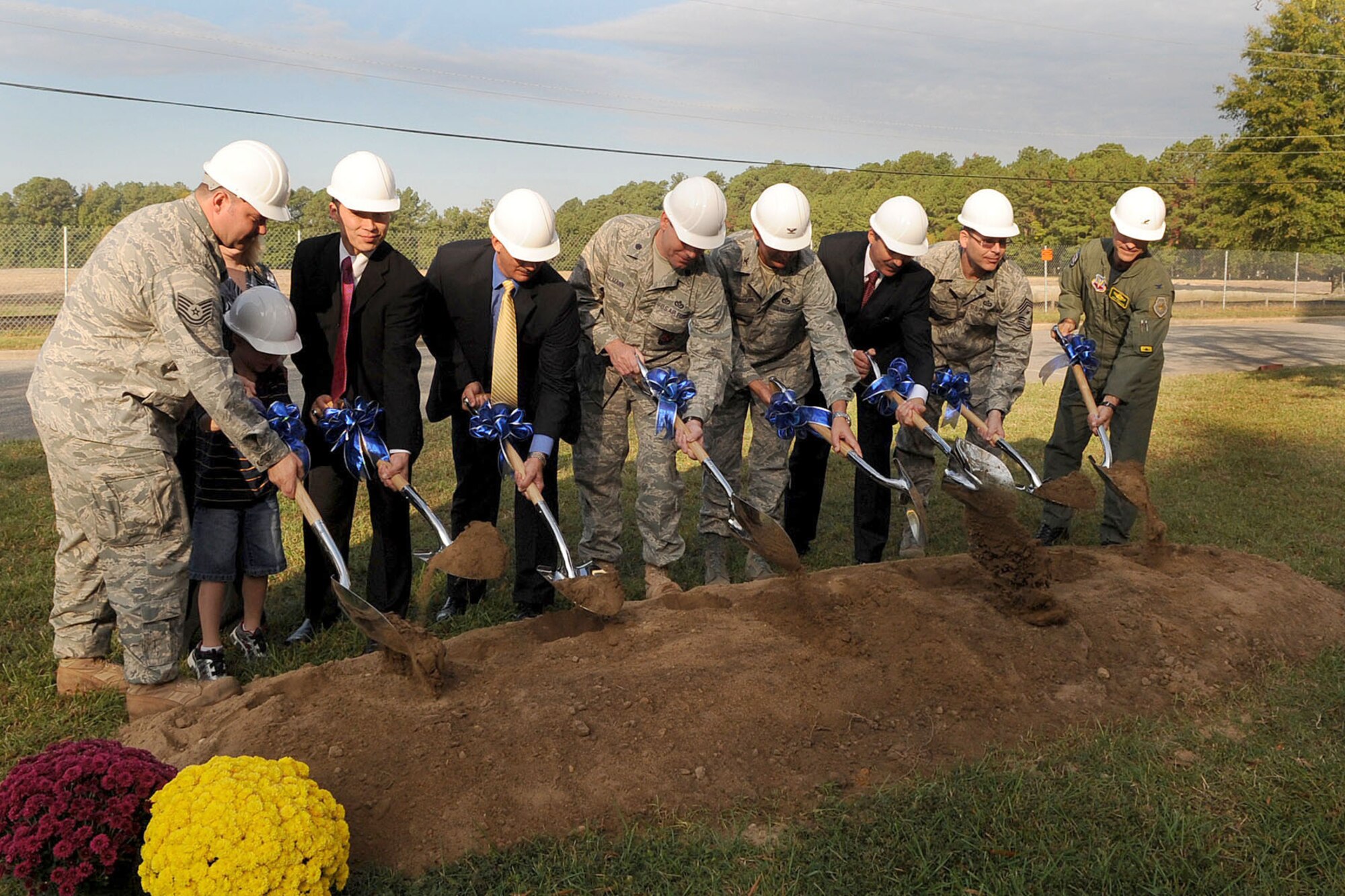 LANGLEY AIR FORCE BASE, Va. -- Col. Jeffrey Prichard, 1st Fighter Wing vice commander (right) and other distinguished visitors break ground for the new housing at Bethel Manor Oct. 15.  Development on more than 1,400 housing units is estimated to cost over $300 million and be completed by September 2014.  (U.S. Air Force photo/Airman Rebecca Montez)