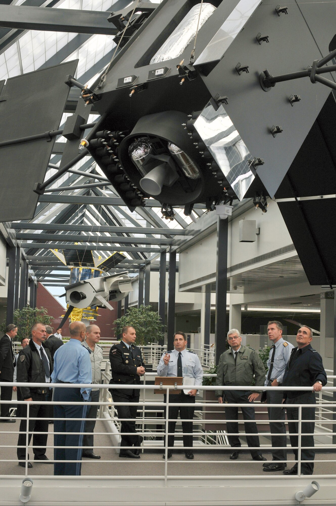 Air chiefs from 19 NATO nations view satellite static displays Oct. 7 at the Air Force Space Command Headquarters at Peterson Air Force Base, Colo. The NATO air chiefs toured U.S. Air Force facilities and received briefings at five Air Force bases during their visit. (U.S. Air Force photo/Senior Airman Nathan Lipscomb) 
