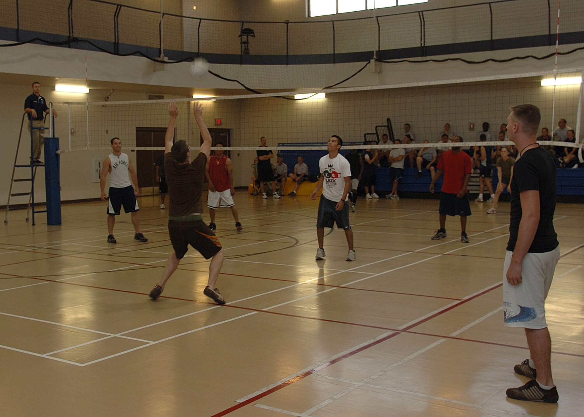 49th Civil Engineers Squadron's A and B volleyball teams compete against each other during Sports Day, October 10, at the Fitness and Sports Center at Holloman Air Force Base, N.M. The Fitness and Sports Center held 15 events and over 2000 Team Holloman members participated in the events. (U.S. Air Force photo/Airman 1st Class John D. Strong II) 