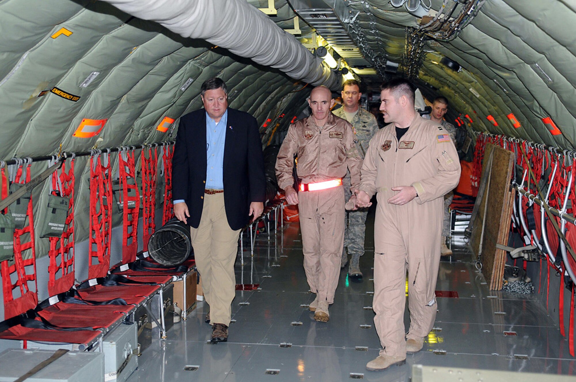 Capt. Jordan Collins (right) briefs Secretary of the Air Force Michael B. Donley about new capabilities on the KC-135 Stratotanker Oct. 15 at Manas Air Base, Kyrgyzstan. While at Manas AB, the secretary toured the base and held an Airmen's call to share the latest Air Force issues and priorities. Captain Collins is assigned to the 376th Expeditionary Operations Group. (U.S. Air Force photo/Senior Airman Ruth Holcomb) 

