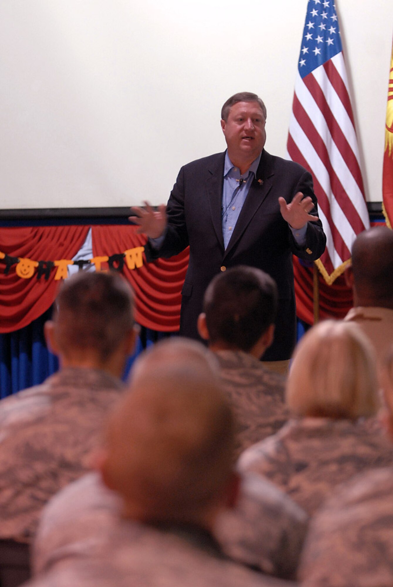 Secretary of the Air Force Michael B. Donley addresses more than 200 personnel during an Airmen's call during his Oct. 15 visit to Manas Air Base, Kyrgyzstan. While here, he toured the base and spoke to Airmen on Air Force issues and priorities. (U.S. Air Force photo/Senior Airman Ruth Holcomb) 

