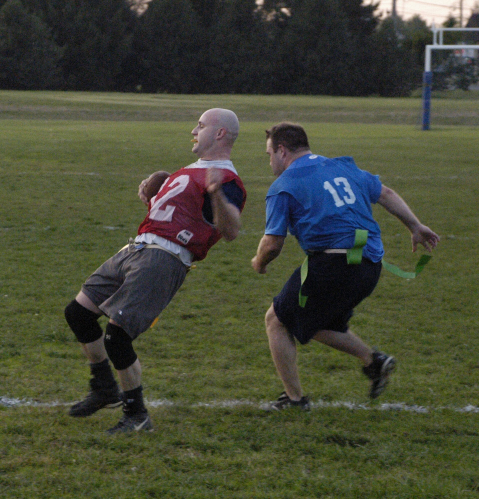 Matthew Hunt, 3 AS tight end and linebacker, just misses Brian Meade, OSS tight end, who scored a touch down in the second half.                     