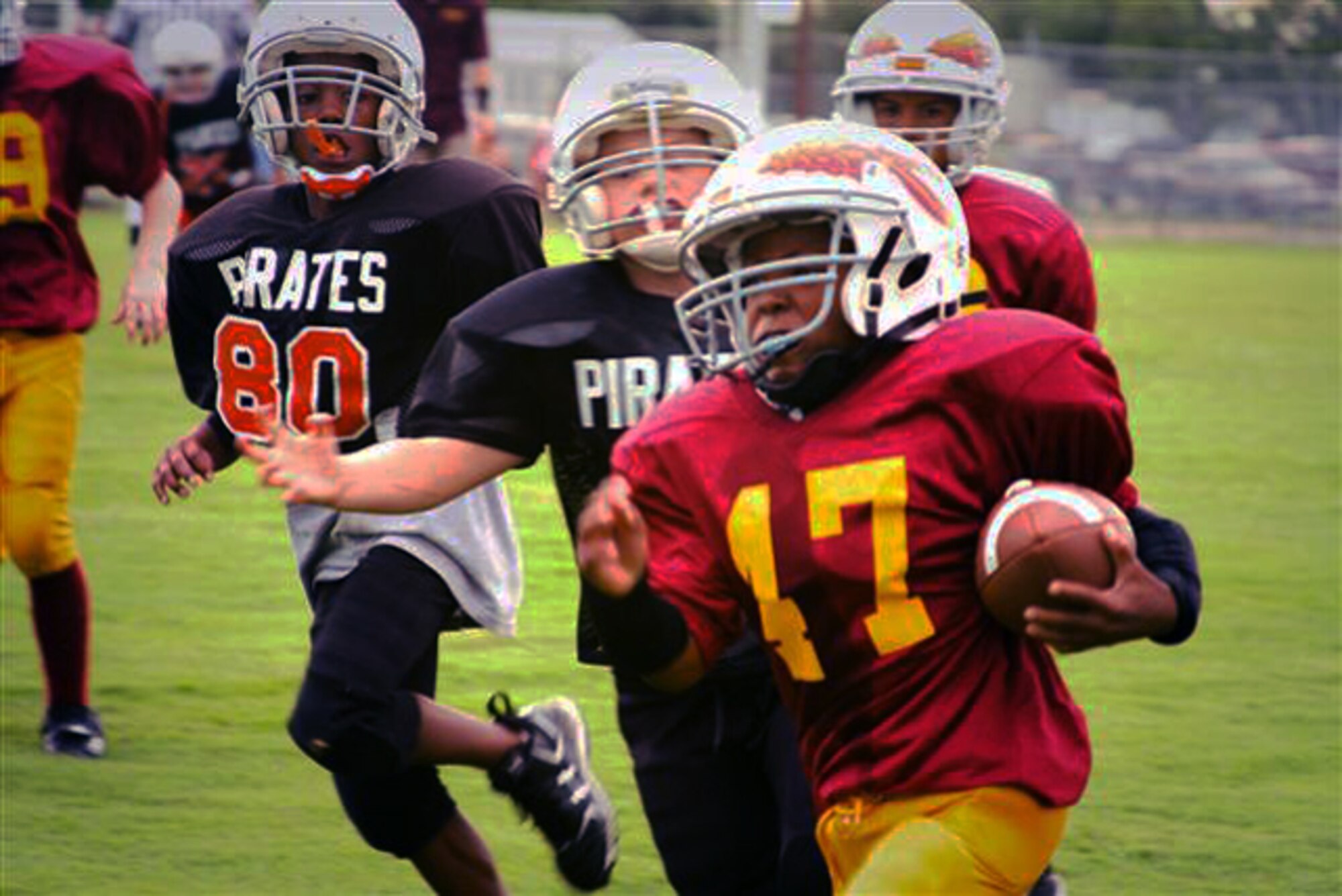 Kolby Youngblood, a Redskin runs a kick-off return for  touchdown at the Top of Texas North Conference Pee-Wee championship Oct. 11. The Wichita Falls North Redskins, comprised of military family members aged 8-10 years-old, defeated the Bowie North Pirates 14-6. (U.S. Air Force photo)