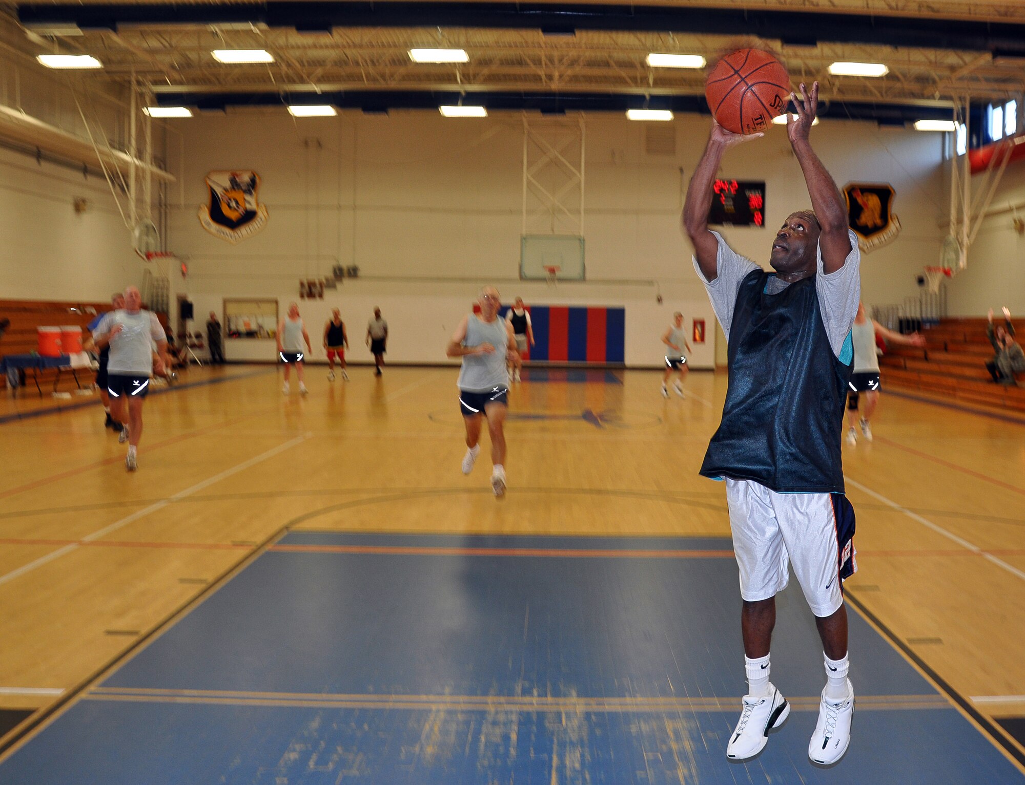 EGLIN AIR FORCE BASE, Fla. -- In a basketball game Oct. 14, the latest of four competitions between the Chiefs and Eagles, the Chiefs managed to come out on top after an overtime scurmish that made for an epic victory 40-37. The Chiefs vs Eagles is a competition between base leadership with the Chiefs consisting of all Chief Master Sergeants, and the Eagles all Colonels. The key players for both teams were Chief Master Sgt. Donald Morris, 33rd Aircraft Maintenance Squadron, with nine points and Col. Steven DePalmer, 53rd Wing Commander, with 17 points. (US Air Force photo/ Airman 1st Class Anthony Jennings)