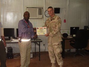 BALAD AIR BASE, Iraq -- Airman 1st Class Troy Falkena is currently deployed from Langley. He said the most useful item he packed was Q-Tips and the moment he realized he "wasn't in Kansas anymore" was when he stepped on to the C-130 in full battle rattle to fly to Balad. (Courtesy photo)