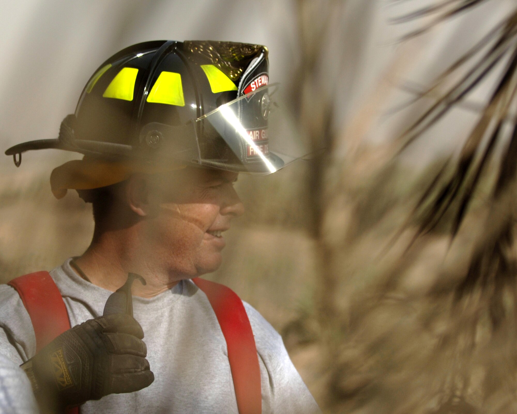 10/15/2008 ? SATHER AIR BASE, Iraq ? Staff Sgt. Timothy Fay serves as the incident commander during a live burn exercise at Sather Air Base.  Sergeant Fay is a New York Air National Guard firefighter deployed to the 447th Expeditionary Civil Engineer Squadron from the 105th Wing at Stewart Air National Guard Base. Sergeant Fay?s unit is responsible for fire protection and rescue operations for the base and airfield on the west side of Baghdad International Airport, one of the busiest aerial hubs in Iraq. (U.S. Air Force photo by Master Sgt. Brian Davidson)