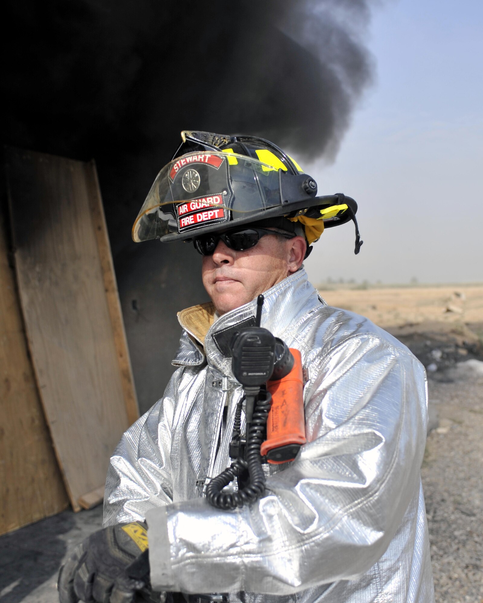 10/15/2008 ? SATHER AIR BASE, Iraq ? Staff Sgt. Timothy Fay serves as the incident commander during a live burn exercise at Sather Air Base.  Sergeant Fay is a New York Air National Guard firefighter deployed to the 447th Expeditionary Civil Engineer Squadron from the 105th Wing at Stewart Air National Guard Base. Sergeant Fay?s unit is responsible for fire protection and rescue operations for the base and airfield on the west side of Baghdad International Airport, one of the busiest aerial hubs in Iraq. (U.S. Air Force photo by Master Sgt. Brian Davidson)
