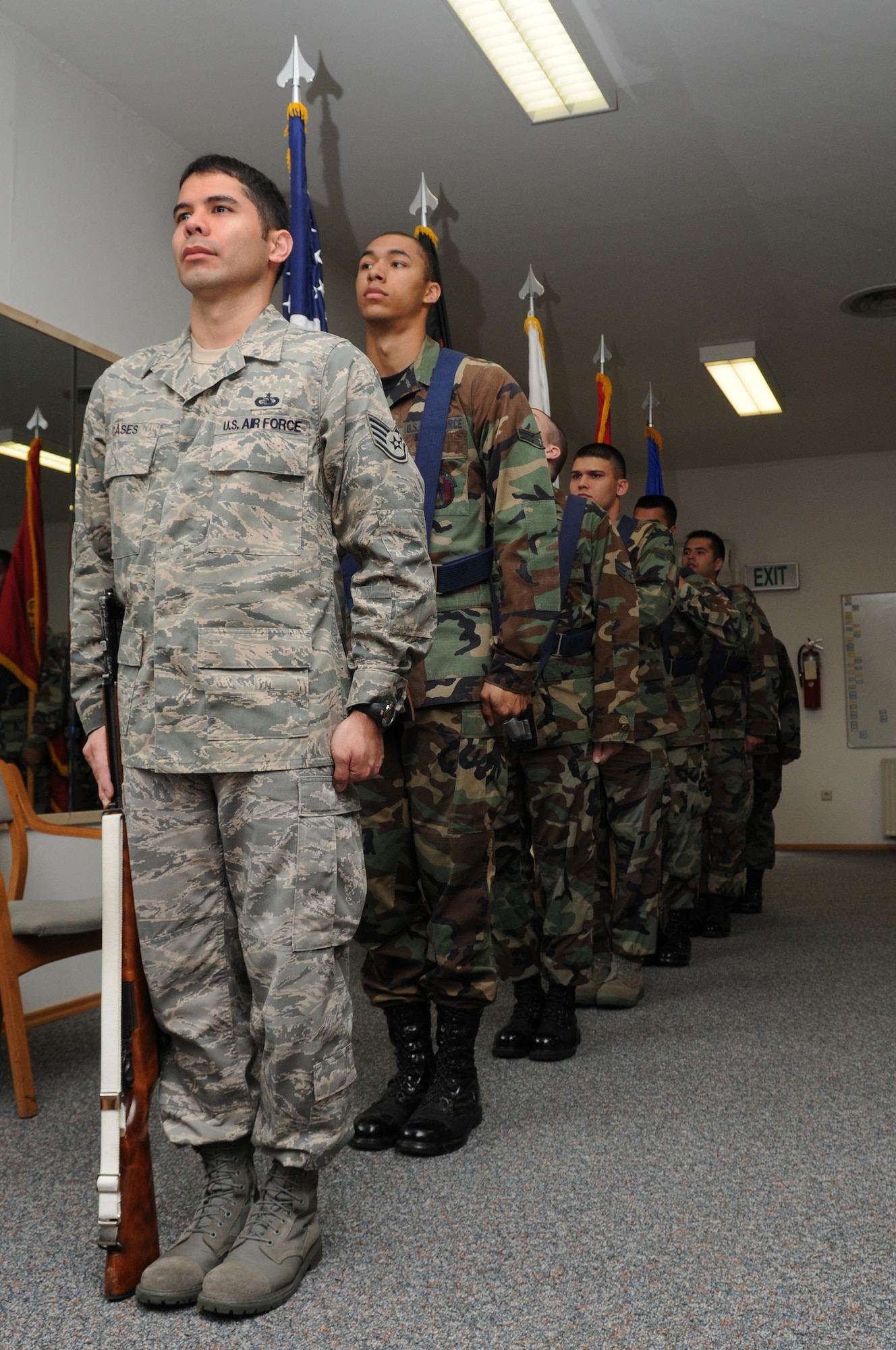 Air Force members stand in a line formation during one of their Honor Guard practice, Ramstein Air Base, Germany, Oct. 15, 2008.The Ramstein Honor Guard practice weekly to ensure they all look sharp during any type of ceremony. (U.S. photo Air Force photo by Airman 1st Class Grovert Fuentes-Contreras)