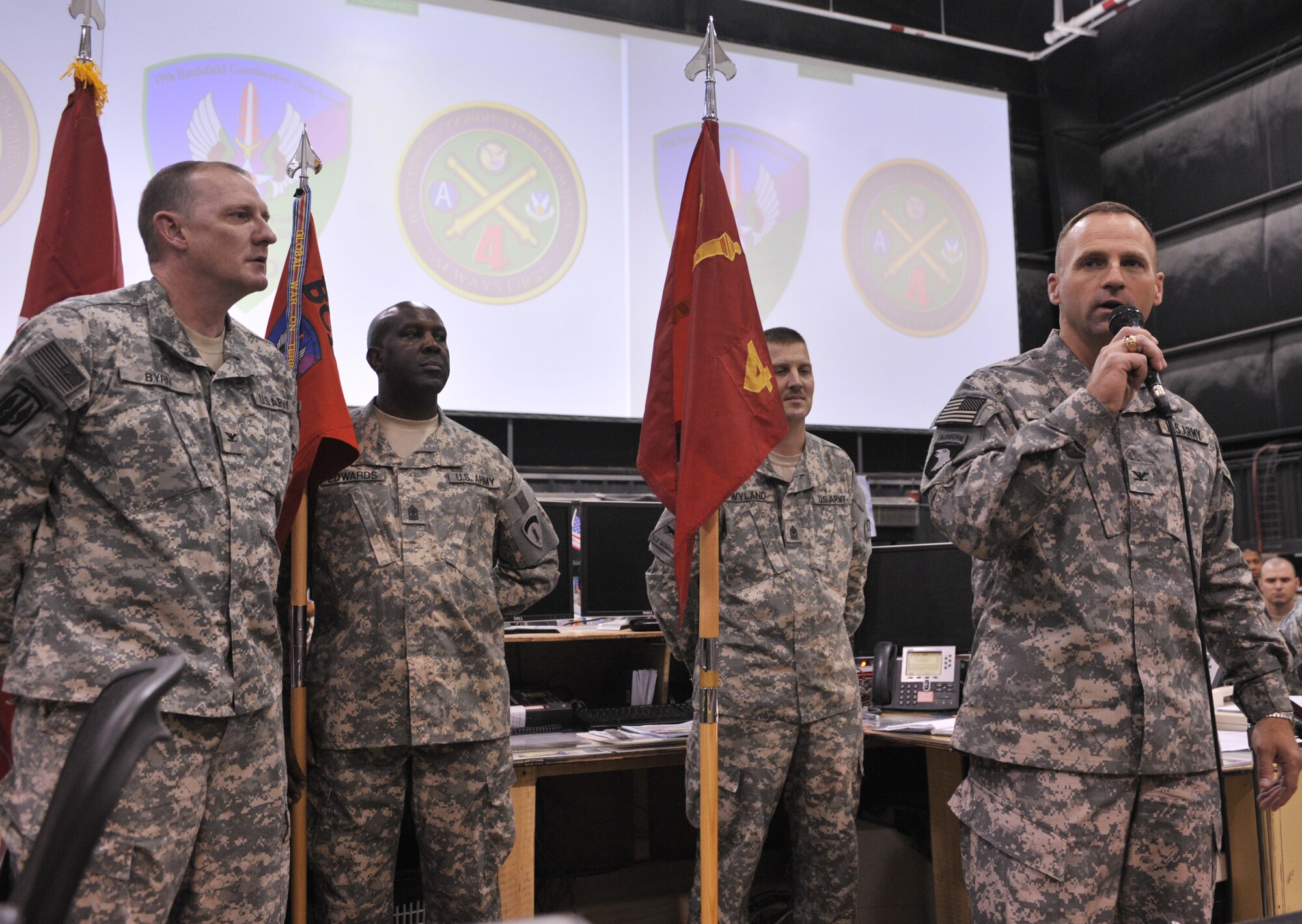 Army Col. Kevin Felix, 4th Battlefield Coordination Detachment commander, speaks to members of the Combined Air and Space Operations Center during a transfer of authority ceremony Oct. 15. The 4th BCD assumed authority from the 19th Battlefield Coordination Detachment. Army Lt. Gen. James J. Lovelace, Combined Forces Land Component commander and U.S. Army Central commander, presided over the ceremony. The 4th BCD will serve as the liaison between the CFLCC and the Combined Forces Air Component Commander in the integration and synchronization of air power in direct support of maneuver forces in Iraq and Afghanistan. (U.S. Air Force photo by Staff Sgt. Aaron Allmon)