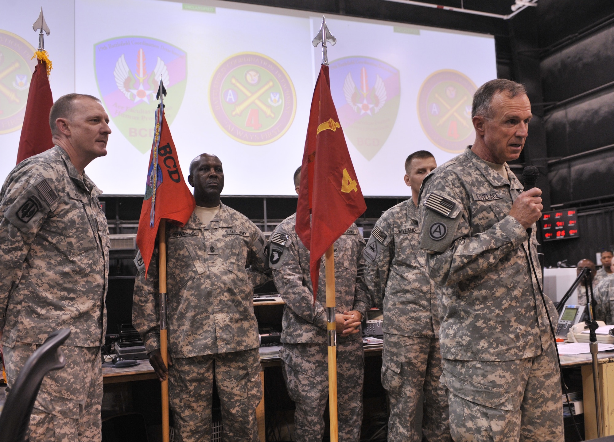 Army Lt. Gen. James J. Lovelace, Combined Forces Land Component commander and U.S. Army Central commander, speaks to members of the Combined Air and Space Operations Center during a transfer of authority ceremony Oct. 15. The 4th Battlefield Coordination Detachment assumed authority from the 19th Battlefield Coordination Detachment. The 4th BCD will serve as the liaison between the CFLCC and the Combined Forces Air Component Commander in the integration and synchronization of air power in direct support of maneuver forces in Iraq and Afghanistan. (U.S. Air Force photo by Staff Sgt. Aaron Allmon)