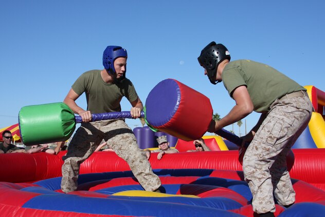 Pfc. Logan Rowe, a tank crewman with Company D, 1st Tank Battalion, bouts Pfc. Daniel Roarty, Headquarters and Service Company, 1st Tank Battalion, in the pugil stick event of the sixth annual Combat Center Challenge at Victory Field Oct. 17.