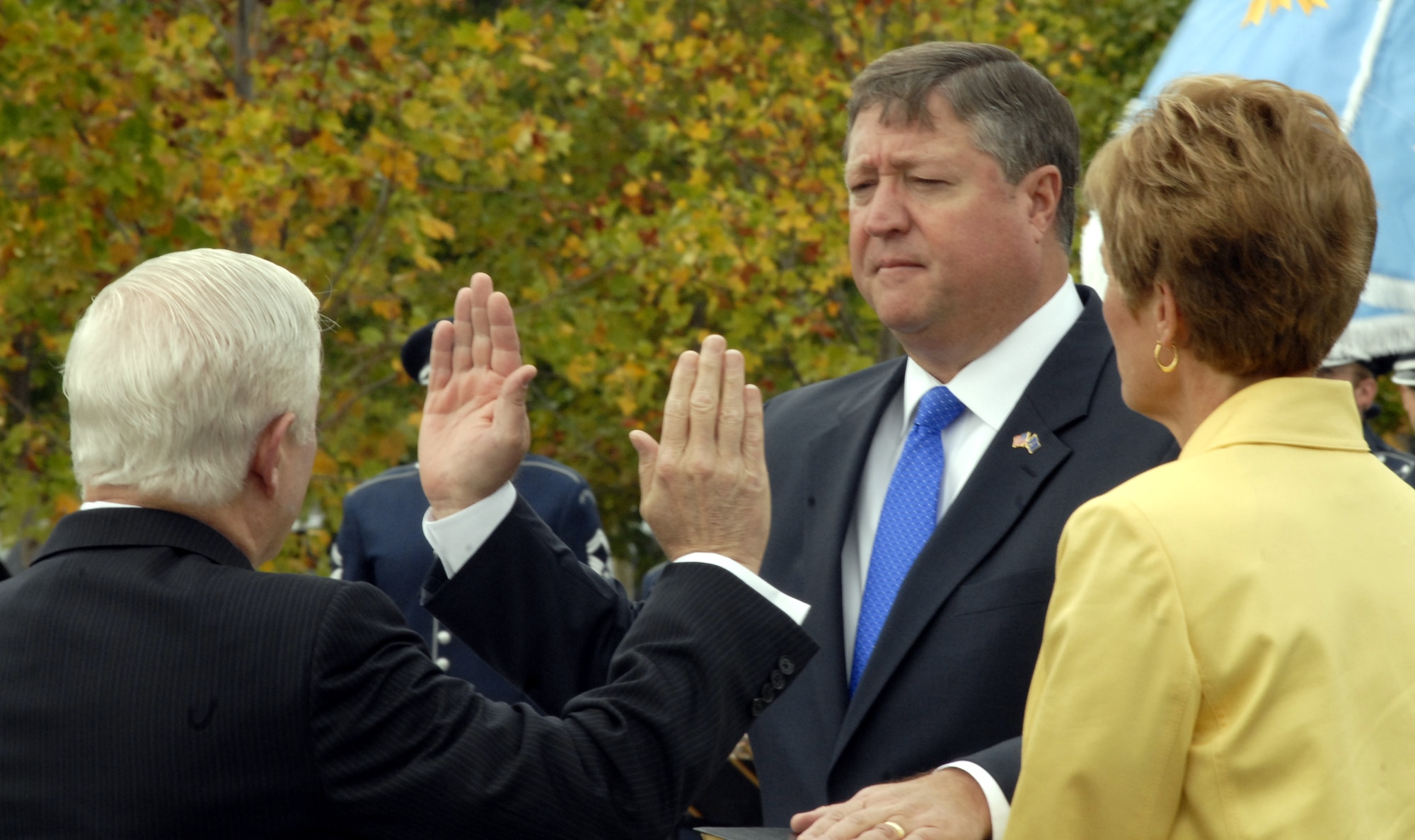 Secretary of Defense Robert Gates (left) swears in Michael Donley as the 22nd secretary of the Air Force at a ceremony Oct. 17 at the Air Force Memorial in Arlington, Va., as his wife, Gail Donley, looks on. (U.S. Air Force photo/Staff Sgt. J.G. Buzanowski)