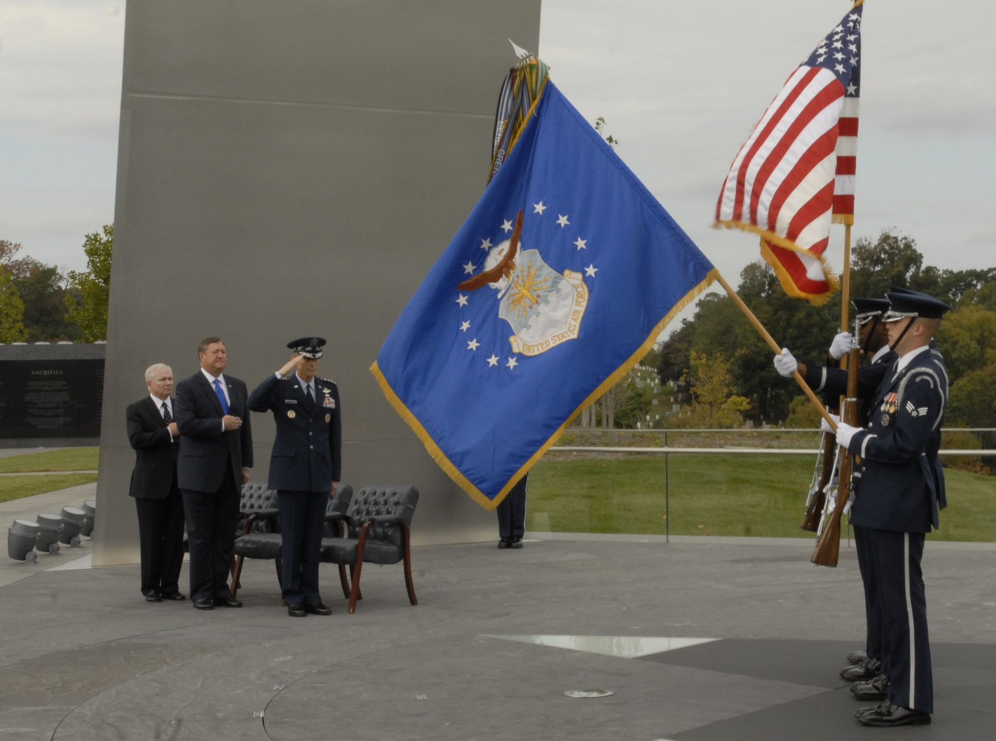 Secretary of Defense Robert Gates (from left), Secretary of the Air Force Michael Donley and Chief of Staff of the Air Force Gen. Norton Schwartz salute the flag as the Air Force band plays the national anthem at the swearing in ceremony for Secretary Donley. He was sworn in as the 22nd secretary of the Air Force Oct. 17 at the Air Force Memorial in Arlington, Va.  (U.S. Air Force photo/Staff Sgt. J.G. Buzanowski)