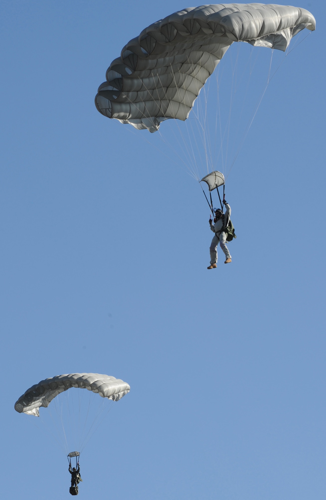 CANNON AIR FORCE BASE, N.M.  -- U.S. Army Special Forces Soldiers jump from an MC-130 Combat Spear during training here Oct. 15. (U.S. Air Force photo/Senior Airman Liliana Moreno)     