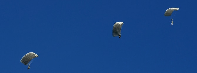 CANNON AIR FORCE BASE, N.M. -- Army Special Forces Soldiers head for the ground following their jump Oct. 15 from an MC-130 Combat Spear. (U.S. Air Force photo/Senior Airman Liliana Moreno)       