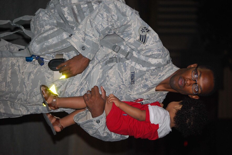 About 110 Airmen from the 556th REDHORSE Squadron returned from deployment on Sunday, October 12, 2008. When the Reserve Airmen arrived home, about 300 friends, family and unit members were there to welcome them with hugs and hand-made banners. REDHORSE is an acronym for Rapid Engineer Deployable Heavy Operational Repair Squadron Engineers. The REDHORSE Airmen deployed to three different countries within the U.S. Central Command Area of Responsibility. During the deployment, they dug wells for Afghanis, repaired existing structures in Iraq and supported base construction and repair needs throughout the AOR. The 556th REDHORSE Squadron is due to relocate to Florida later this year but many of the Reservists will remain at Lackland Air Force Base as new members of the 433rd Civil Engineer Squadron. (U.S. Air Force Photo/Master Sgt. Collen McGee)