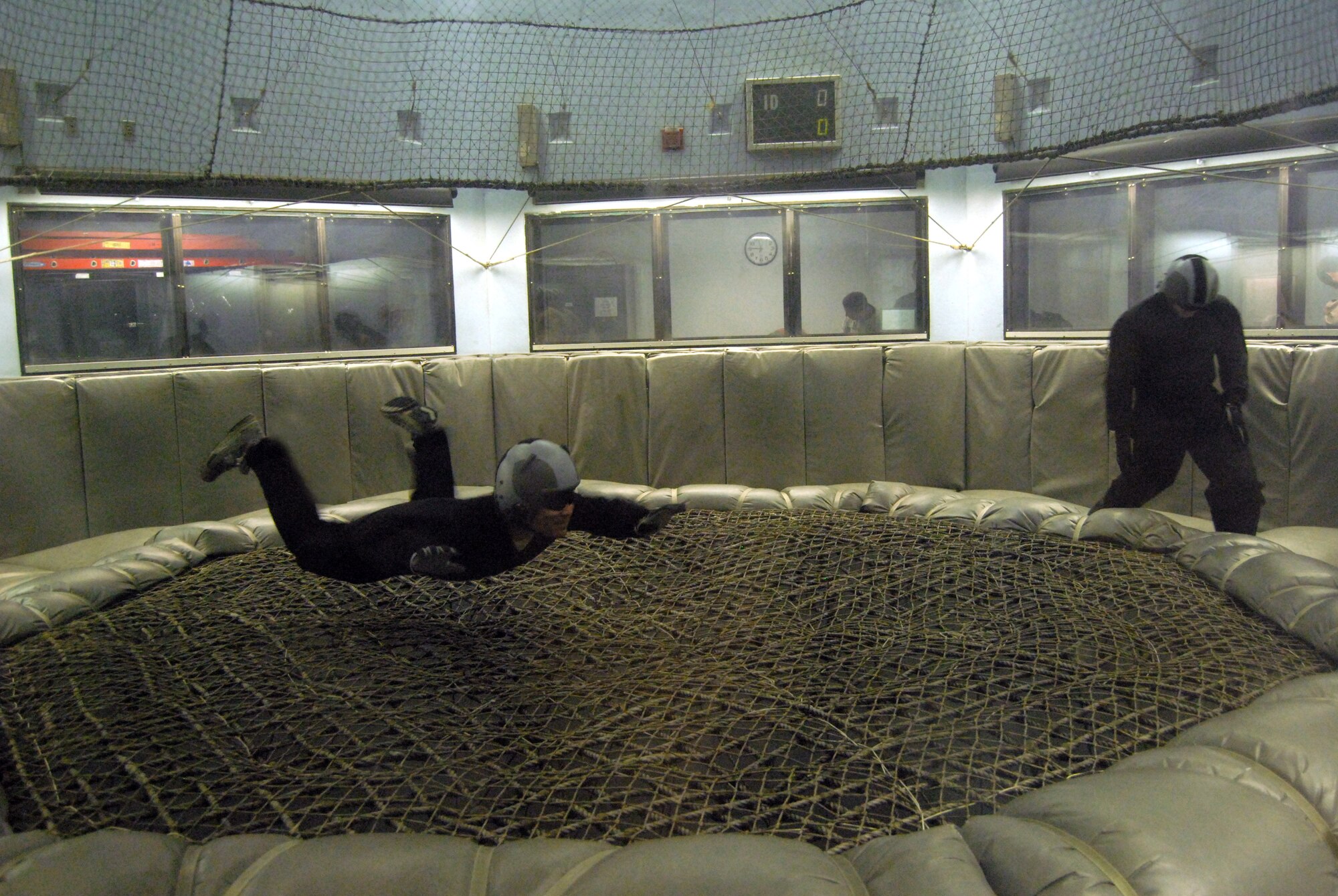 Staff Sgt. Keith Mellon, 14th Air Support Operations Squadron, performs military free fall training at the Fort Bragg Wind Tunnel. The training is designed to acclimate the body to the free fall state so as to better response time in the event of an in-air emergency. (U.S. Air Force Photo by Emily Smith)