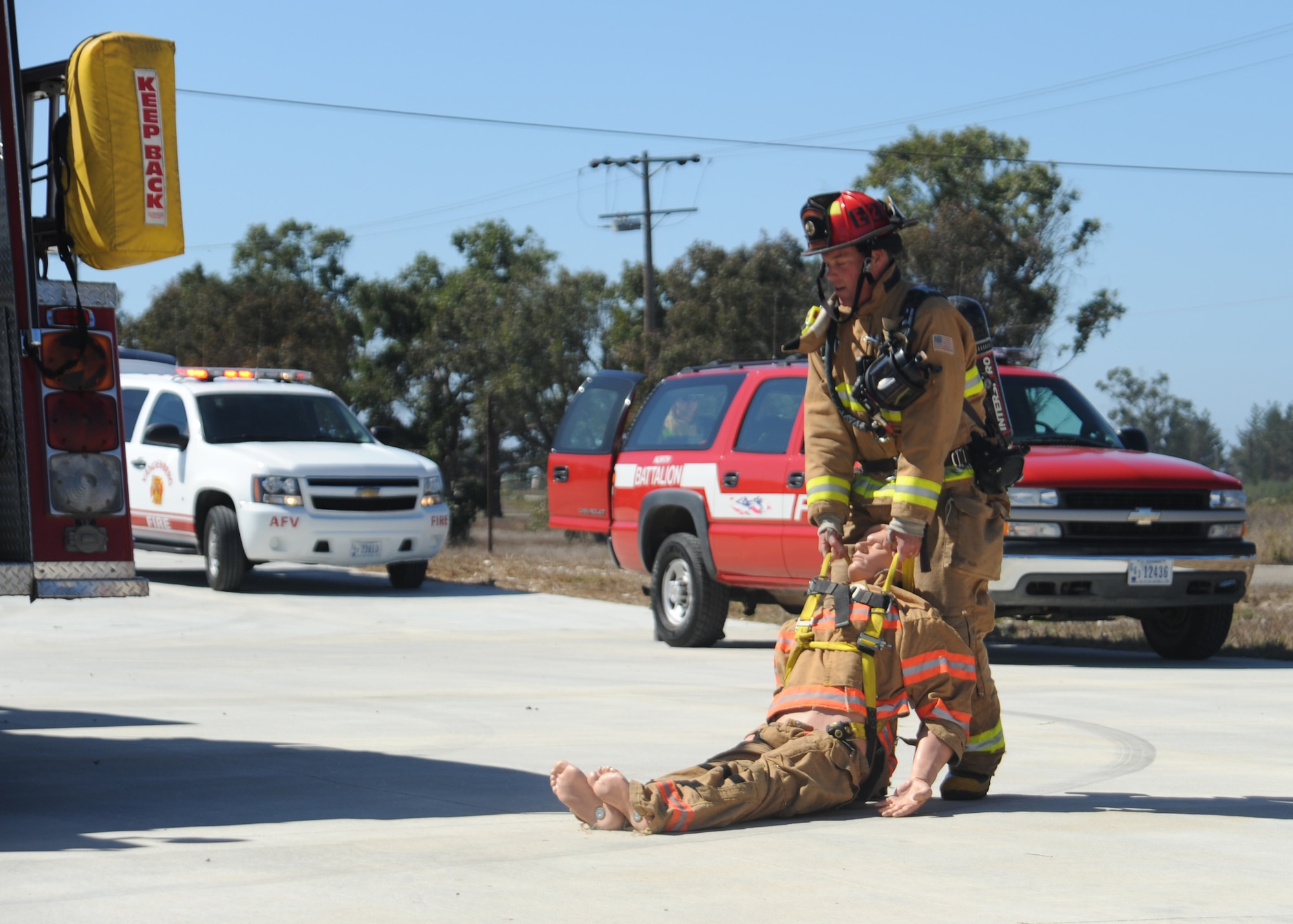 VANDENBERG AIR FORCE BASE, Calif.-- Firefighters practice searching for victims in a simulated burning building Oct. 8 here.(U.S. Air Force photo/Airman 1st Class Andrew Satran)
