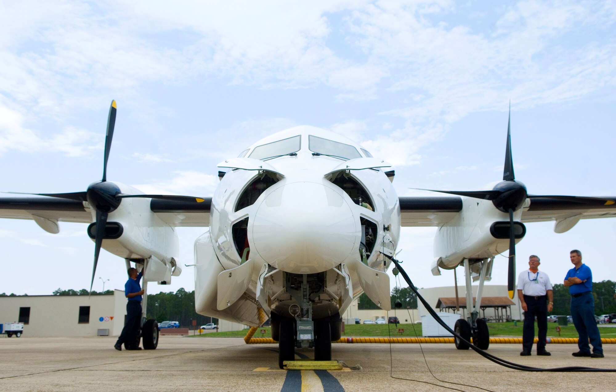 Aircrew members with King Aerospace perform pre-flight checks on an E-9A Aug. 26 at Tyndall Air Force Base, Fla. The E-9A provides support to the air-to-air weapons system evaluations as a surveillance platform. (U.S. Air Force photo/Staff Sgt. Bennie J. Davis III)