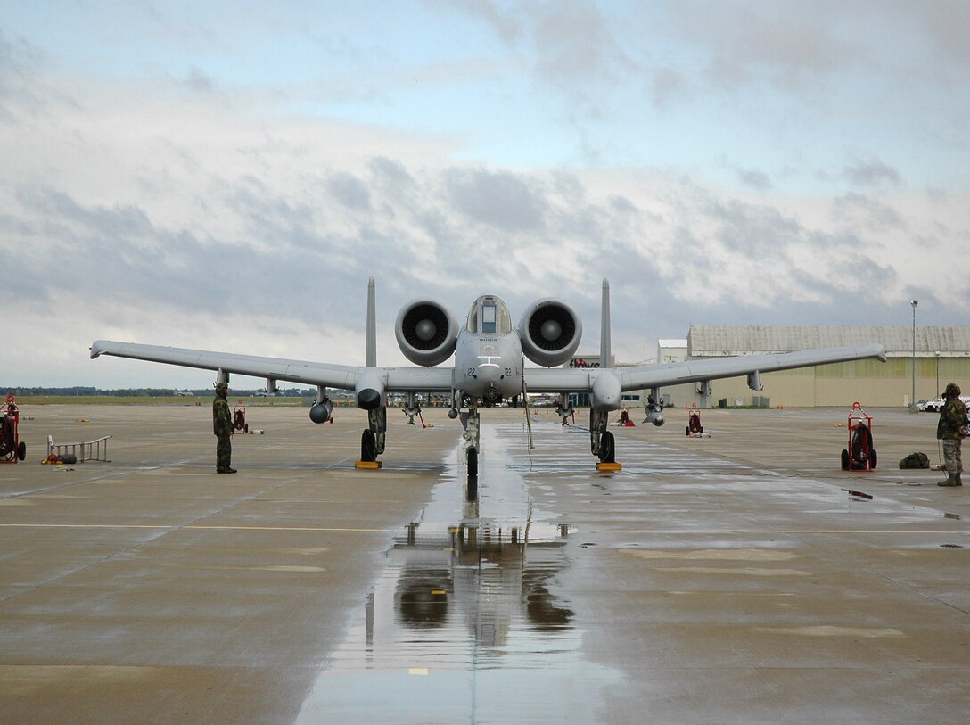 An A-10 Thunderbolt II from the 442nd Fighter Wing is readied for takeoff on the ramp at the Salina, Kan., airport Oct. 15 for a local-area-orientation flight for Hawgsmoke 2008.  Hawgsmoke is a bienniel A-10 bombing and aerial gunnery competition between A-10 squadrons from across the Air Force.  The competition ends Oct. 18.  (U.S. Air Force photo/Lt. Col. Anne Yelderman)