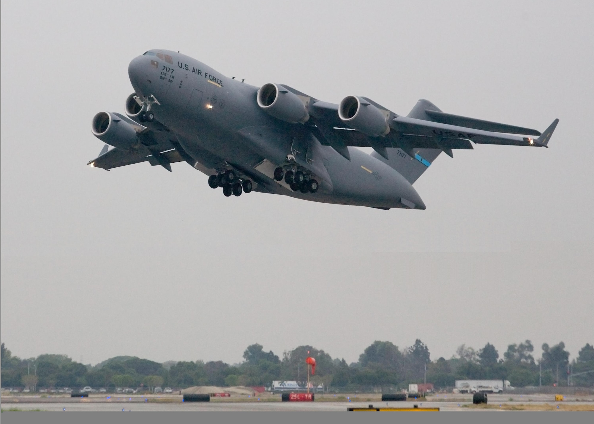 The U.S. Air Force's 177th C-17 Globemaster III lifts off the runway at the Boeing Long Beach plant in California Sept. 11, 2008, following an acceptance ceremony.  The aircraft was accepted by Brig. Gen. Barbara Faulkenberry, deputy director of Strategic Plans, Requirements, and Programs at Headquarters Air Mobility Command.