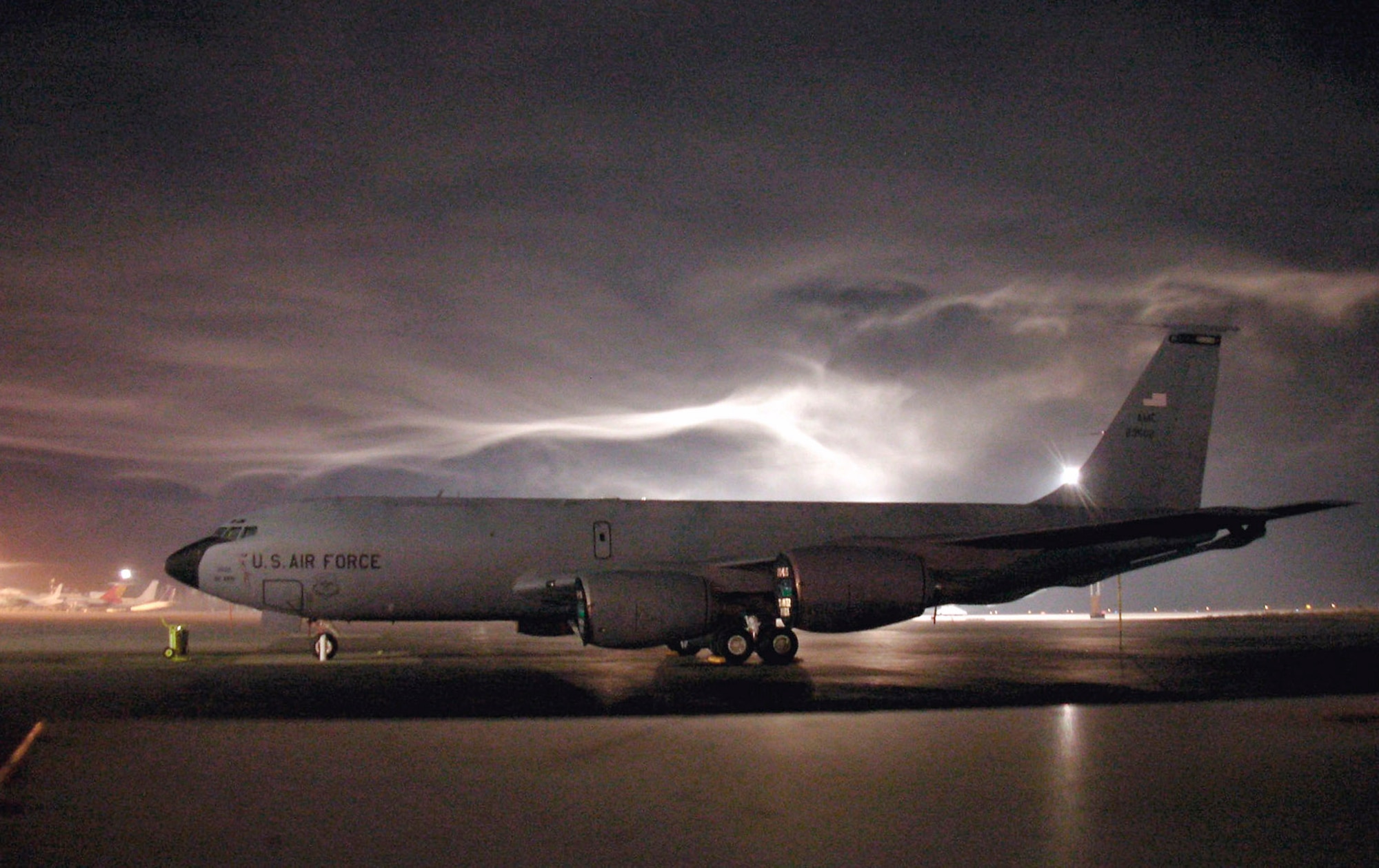 A KC-135 Stratotanker sits on the flightline at a base in Southwest Asia. Air Force and coalition tankers flew 53 sorties and off-loaded approximately 3.3 million pounds of fuel Oct.15. (U.S. Air Force photo/Staff Sgt. Paul Clifford)
 

