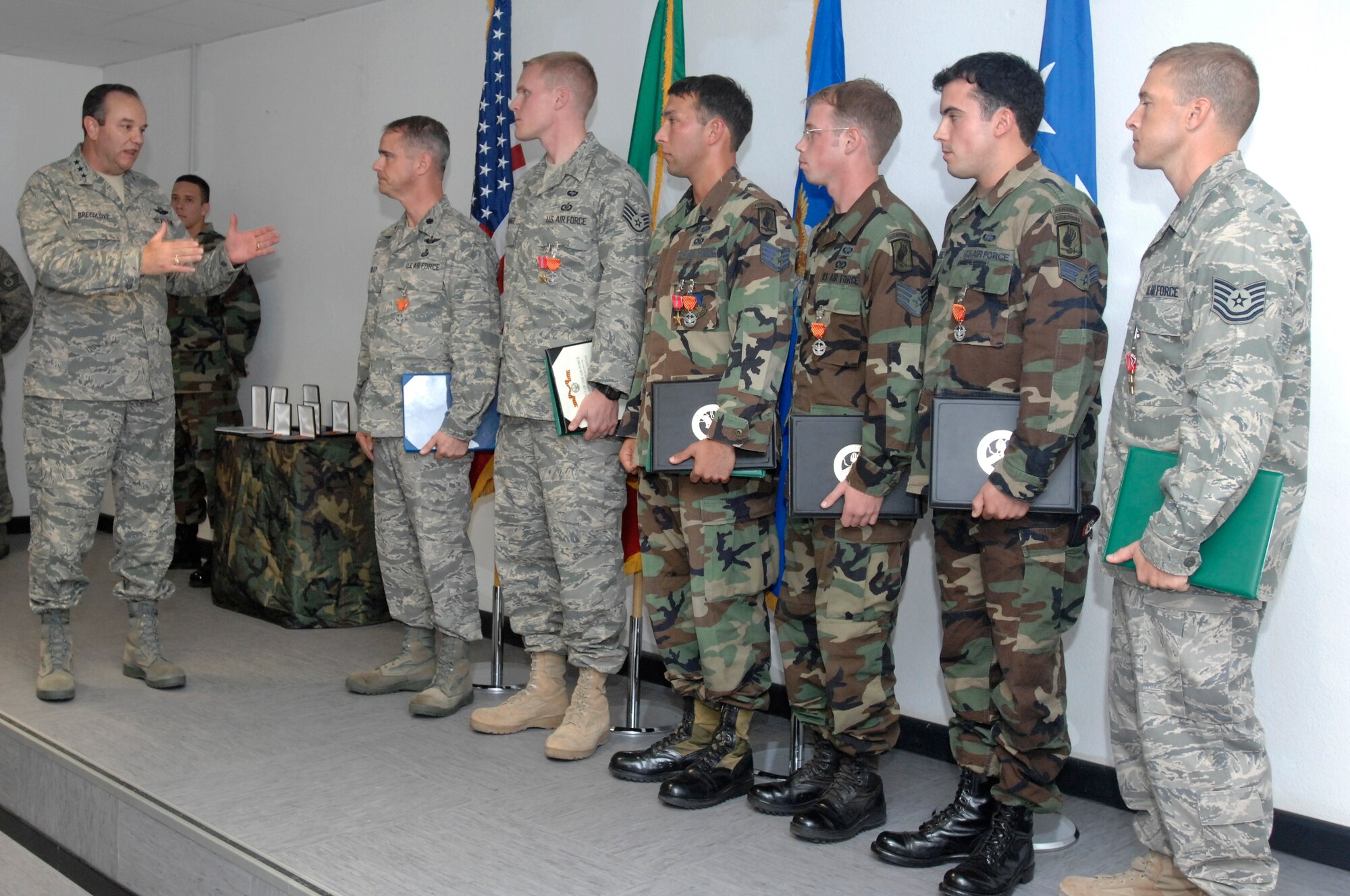 Lt. Gen. Phil Breedlove, 3rd Air Force commander, congratulates the six Airmen from the 8th Air Support Operations Squadron after he awarded them their Bronze Stars and Air Force Combat Action Medals during his visit to Aviano Air Base on Oct. 16. General Breedlove, who previously commanded the 31st Fighter Wing from June 2004 to June 2005, thanked the family members in attendance for their support and personal sacrifices. (U.S. Air Force photo/Airman 1st Class Ashley Wood)