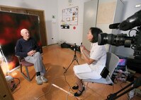 A reporter from Central China Television in Beijing interviews retired Lt. Col. Richard ?Dick? Cole for a documentary about the Doolittle Raiders. Colonel Cole was one of 80 men, led by then Lt. Col. James Doolittle, who volunteered to bomb mainland Japan on April 18, 1942. Colonels Cole and Doolittle were the pilots of the first of 16 B-25 Mitchell medium bombers that launched from the USS Hornet, floating approximately 500 miles from Japan's coast. The mission was the first American strike on the Japanese mainland. (USAF photo by Robbin Cresswell)